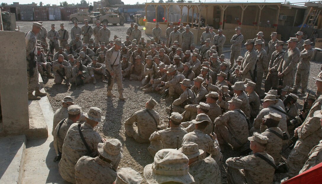 Lt. Col. Andrew Milburn, commanding officer, Task Force 1st Battalion, 3rd Marine Regiment, Regimental Combat Team 1, speaks to Marines of Company A, 1st Bn., 3rd Marines, during their observance of the Marine Corps’ 233rd birthday in Karmah, Iraq, Nov. 10.