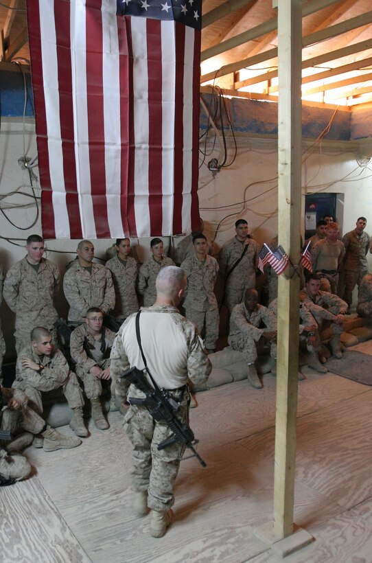 Lt. Col. Andrew Milburn, commanding officer, Task Force 1st Battalion, 3rd Marine Regiment, Regimental Combat Team 1, speaks to Marines of Company C, 1st Bn., 3rd Marines, during their observance of the Marine Corps’ 233rd birthday in Karmah, Iraq, Nov. 10.