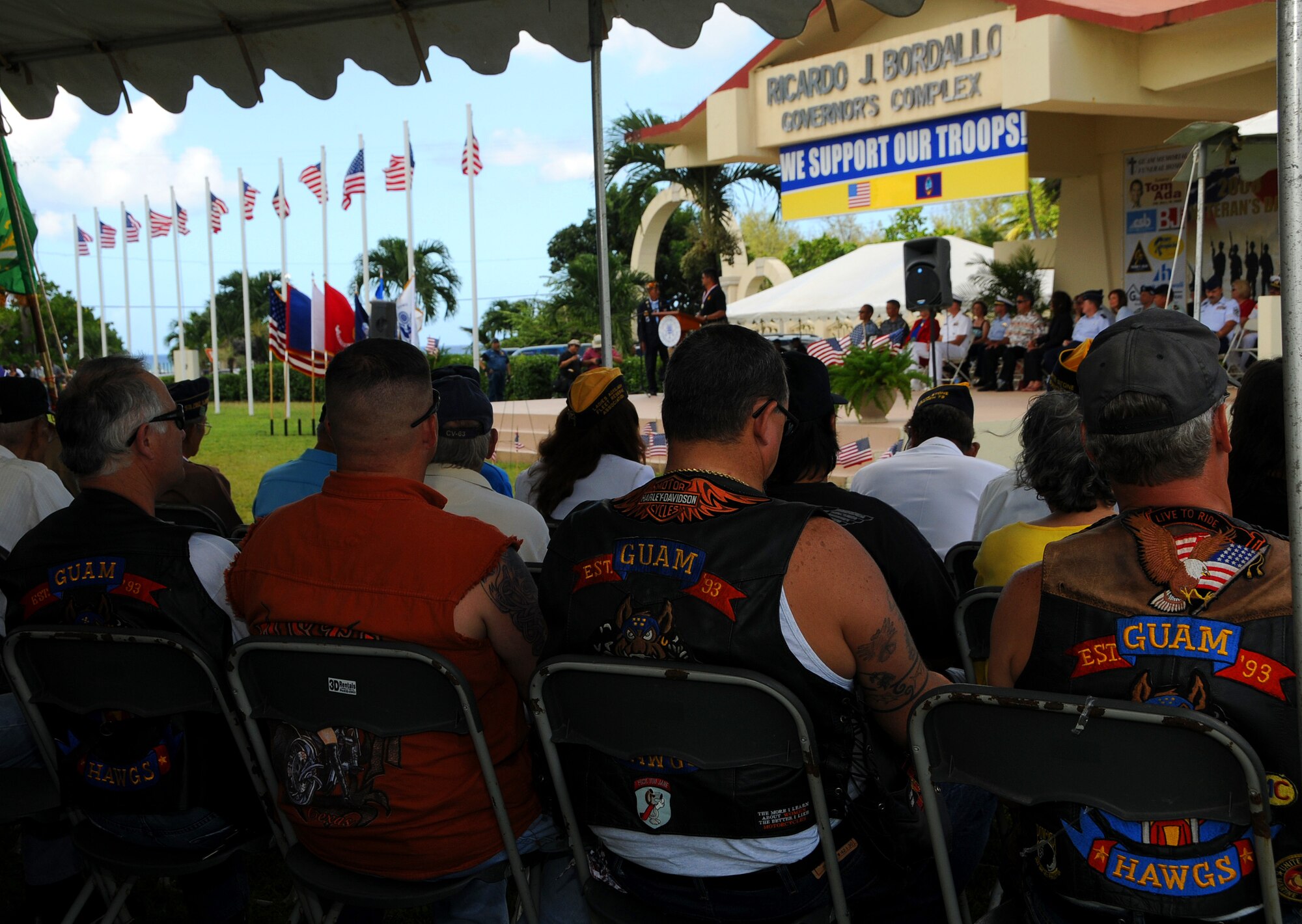 ANDERSEN AIR FORCE BASE, Guam - Veterans look on while the procession of Veterans of the Year are called upon for recognition during the the Veterans Day Ceremony at the Ricardo J. Bordallo Governors Complex in Adelup, Guam Nov. 11. Active and retired members from all over Guam came to represent and take part in the ceremony. (U.S. Air Force photo by Airman 1st Class Courtney Witt)