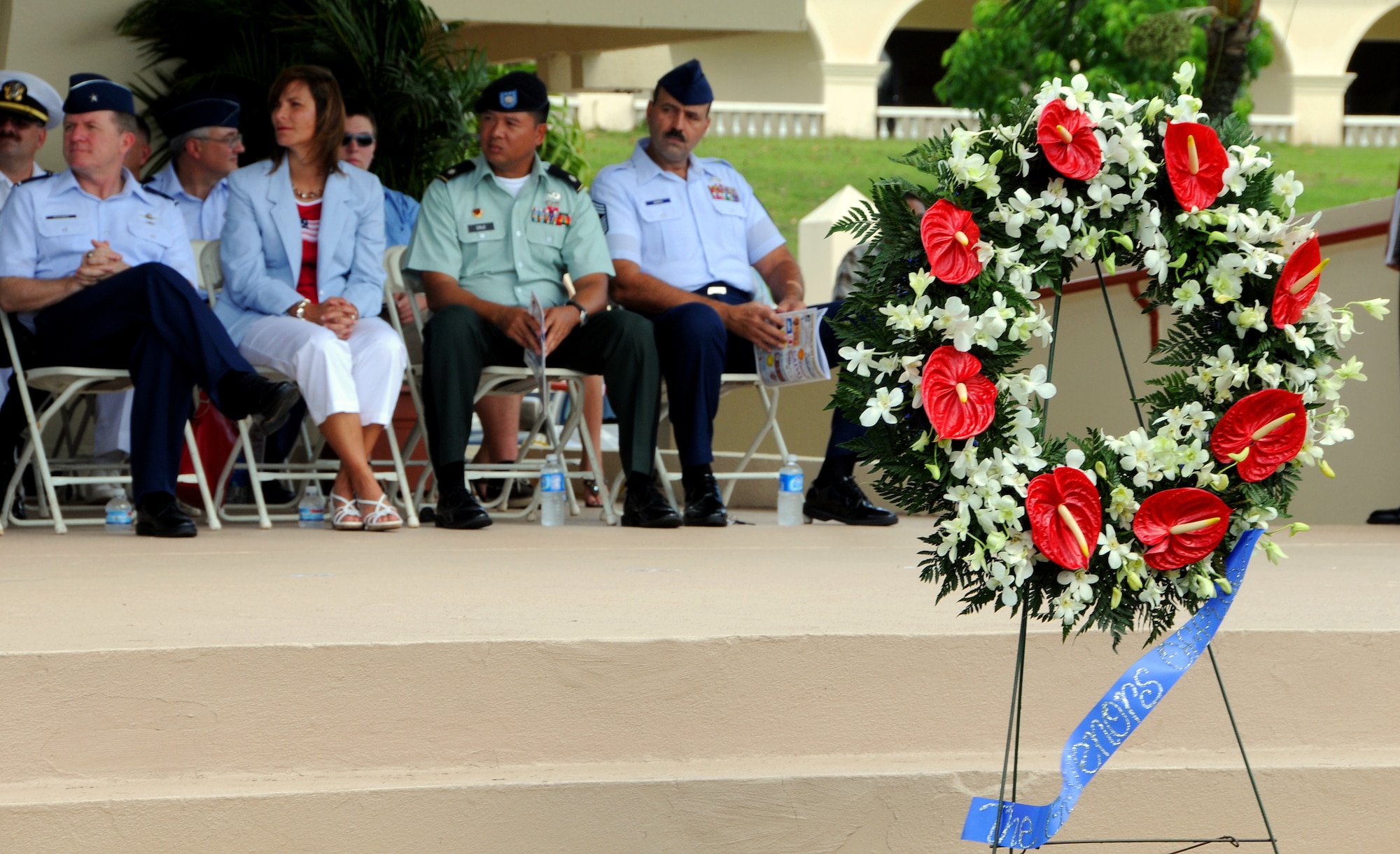 ANDERSEN AIR FORCE BASE, Guam - Distinguished guests listen to speakers during the the Veterans Day Ceremony at the Ricardo J. Bordallo Governors Complex in Adelup, Guam Nov. 11. (U.S. Air Force photo by Airman 1st Class Courtney Witt)

