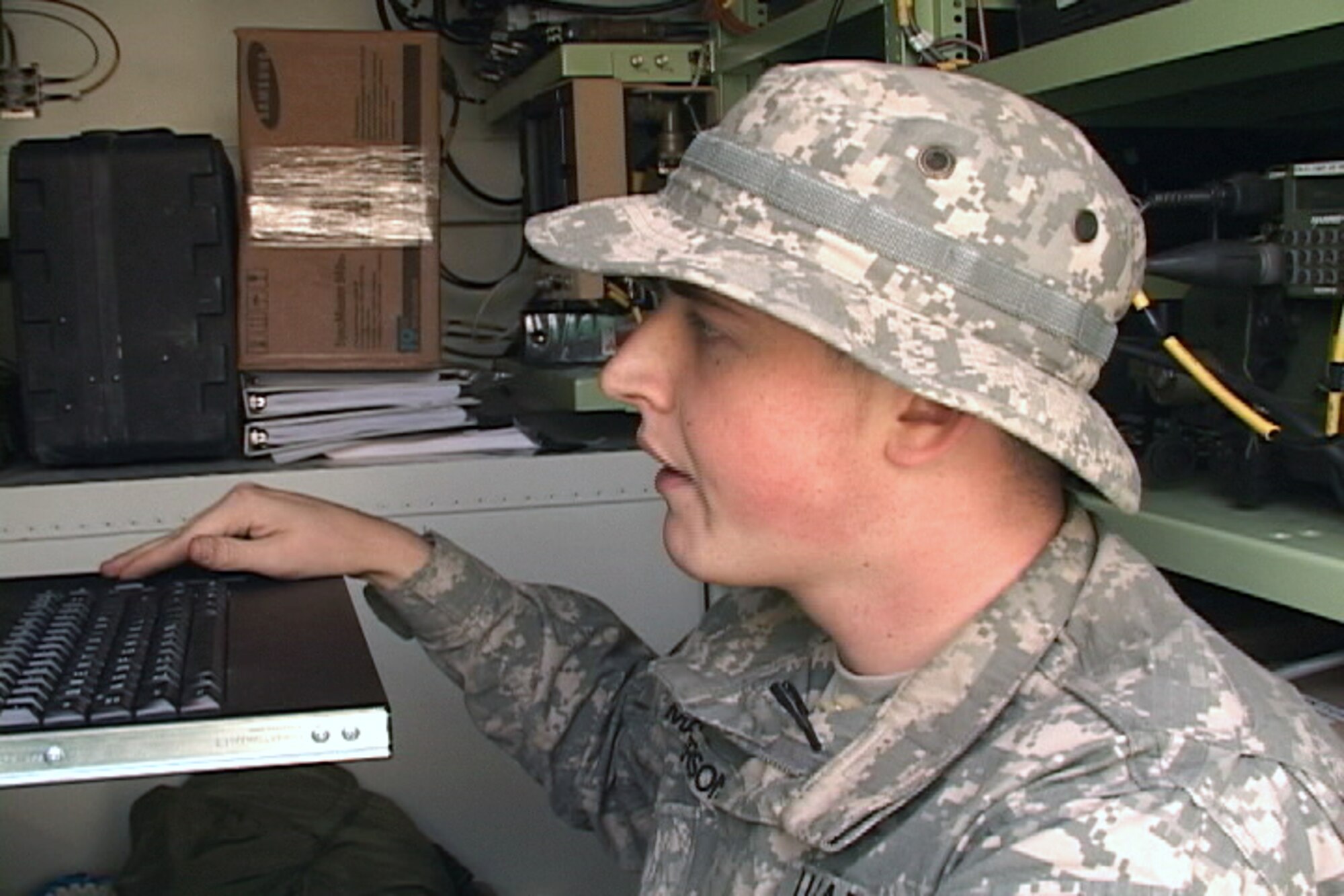 Pvt. Ryan Masterson, aviation operations specialist with 3rd Brigade Combat Team, 1st Infantry Division, monitors airspace to make sure all is clear. (Courtesy Photo/Released)