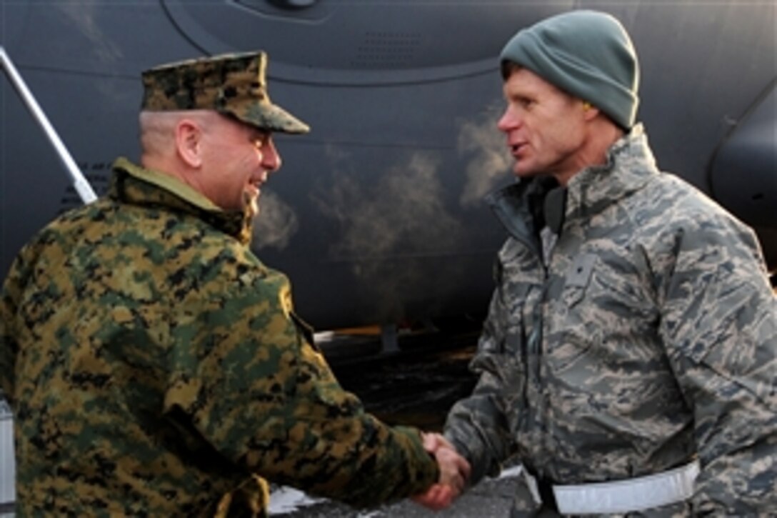 U.S. Marine Gen. James E. Cartwright, left, vice chairman of the Joint Chiefs of Staff, greets Air Force Brig. Gen. Mark Graper, 354th Fighter Wing commander, during a visit to Eielson Air Force Base, Alaska, Nov. 10, 2008. Cartwright took a USO tour to visit Alaska bases, including Eielson, Fort Greeley, Fort Wainwright and Clear Air Force Station.