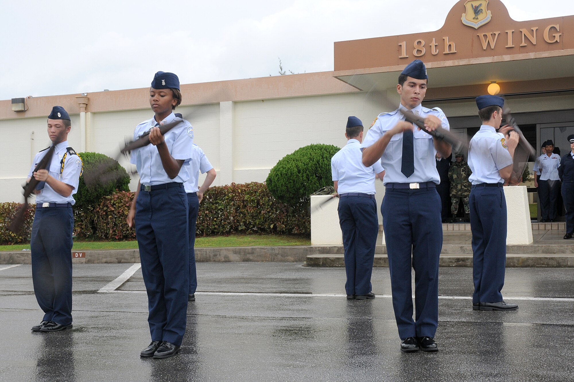 Members of Kadena High School's Junior ROTC perform rifle drill maneuvers
during the Veteran's Day Ceremony held at Kadena Air Base, Japan Nov. 11,
2008. The ceremony was held to honor all who have served in defense of the
United States of America. (U.S. Air Force photo/Airman 1st Class Chad
Warren)
