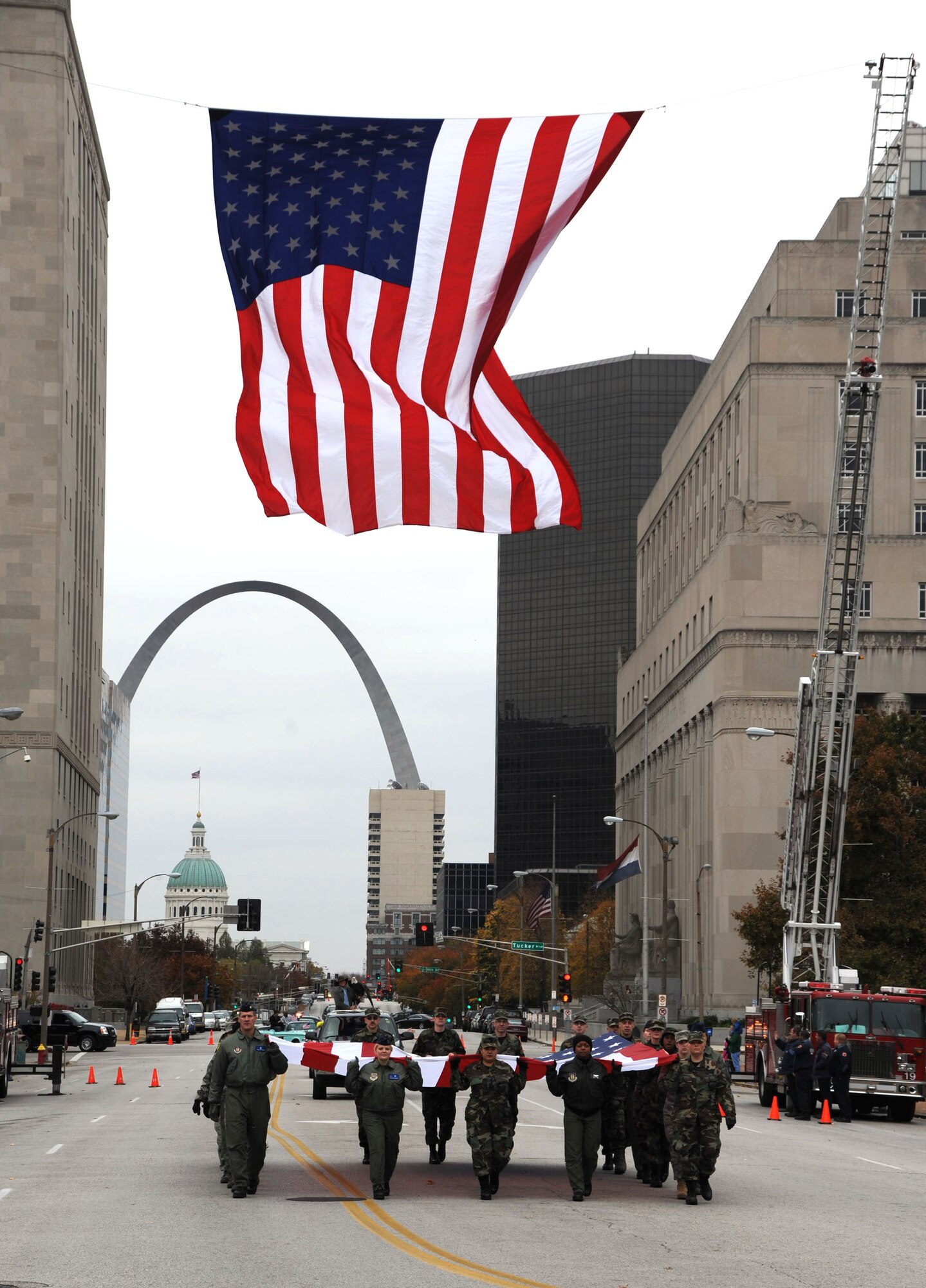 Let freedom ring...The Air Force Reserve Command's 932nd Airlift Wing marched the American flag through the streets of Saint Louis during the 2008 Veteran's Day parade. Reservists come from 33 states to train with the wing located near Belleville, Ill. Want to join or get more information? Call 1-800-257-1212 in America. They will search out other ways to give back to their community and veterans in the coming months.  (U.S. Air Force photo/Tech. Sgt. Gerald Sonnenberg)