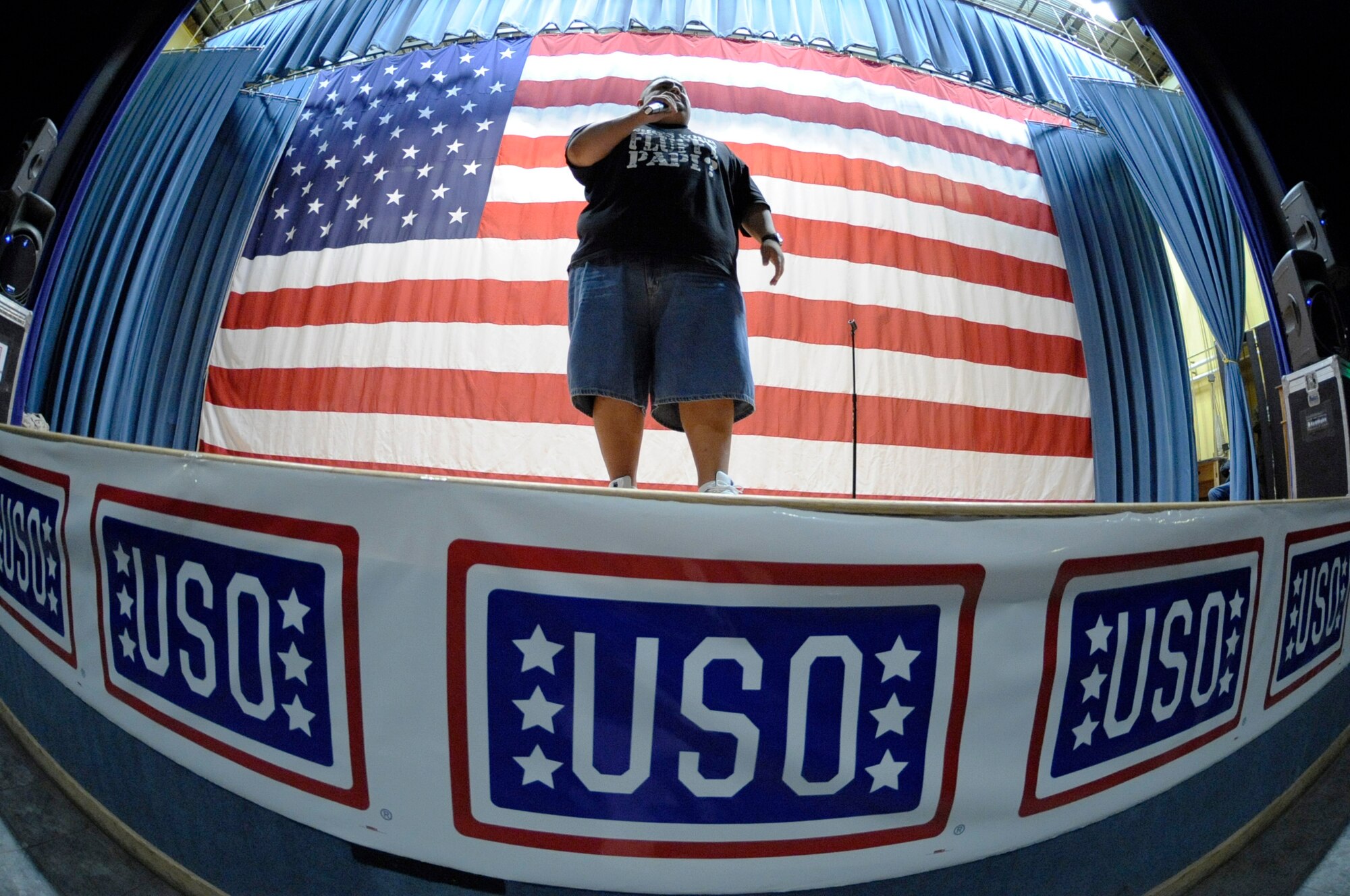 Gabriel Iglesias performs a comedy skit during a United Services Organizations show Nov. 10, 2008, at Eielson Air Force Base, Alaska. The USO tour visited several Alaska bases, including Eielson, Fort Greeley, Fort Wainwright and Clear Air Station.  (U.S. Air Force photo/Senior Airman Jonathan Snyder) (Released)