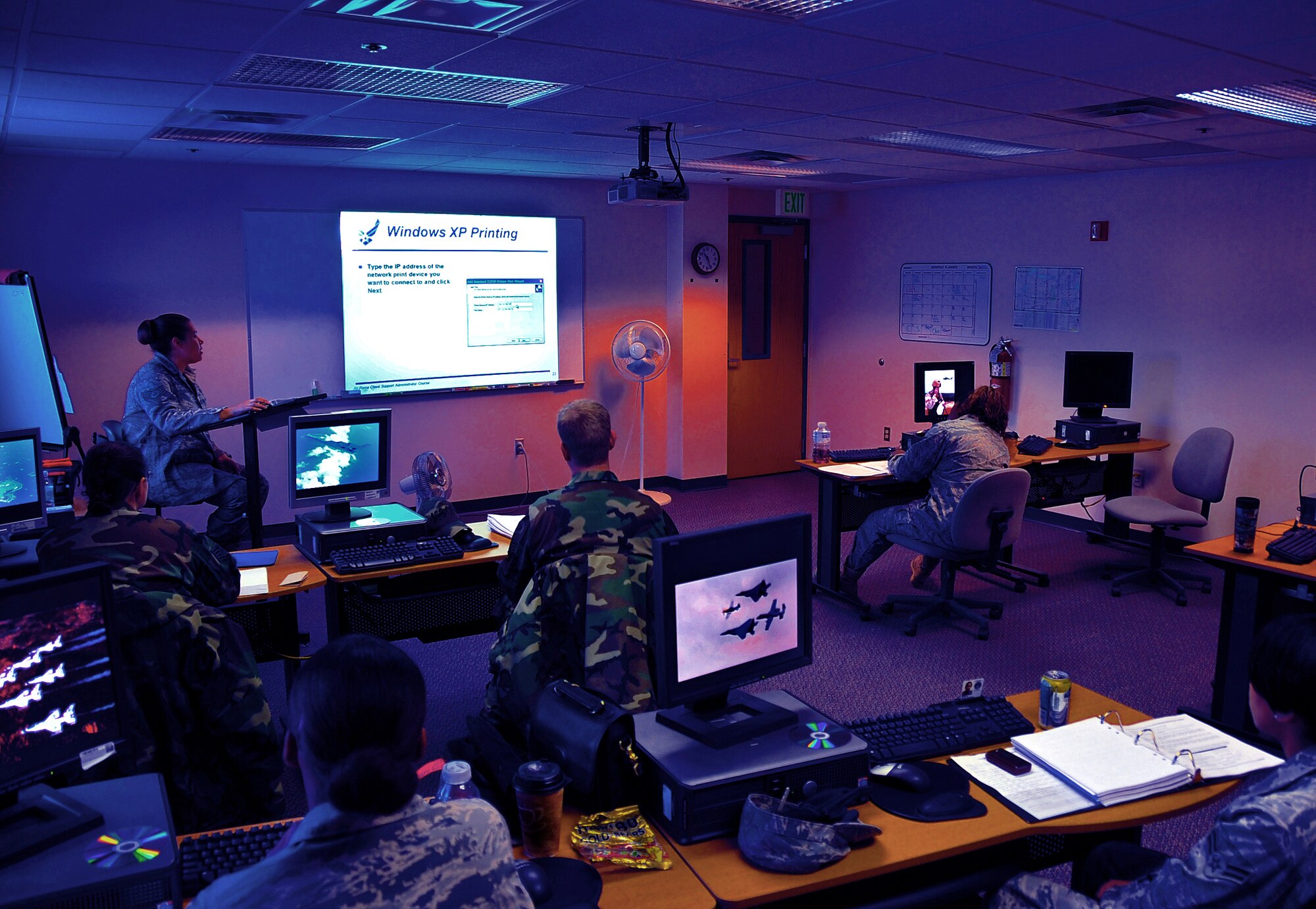 An instructor from the 354th Communications Squadron goes over the ways to set up a printing network Oct. 30 at a Client System Administrator training class. The course develops the skills of Airmen to be later utilized at their respective units. CSA's are charged with setting up, maintaining, and updating the Air Forces networks and computers. (U.S. Air Force photo by Airman 1st Class Willard E. Grande II)