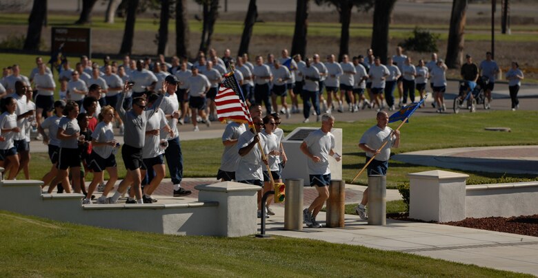 VANDENBERG AIR FORCE BASE, Calif. --  Lt. Gen. William Shelton, the commander of the 14th Air Force and Joint Component Command for Space, leads runners from Team Vandenberg during the last mile of "A Run to Remember." A Run to Remember reached the finish line at 11 a.m. Nov. 11 in a ceremony in front of the 14th Air Force and 30th Space Wing headquarters building here. (U.S. Air Force photo / Airman 1st Class Antoinette Lyons)
