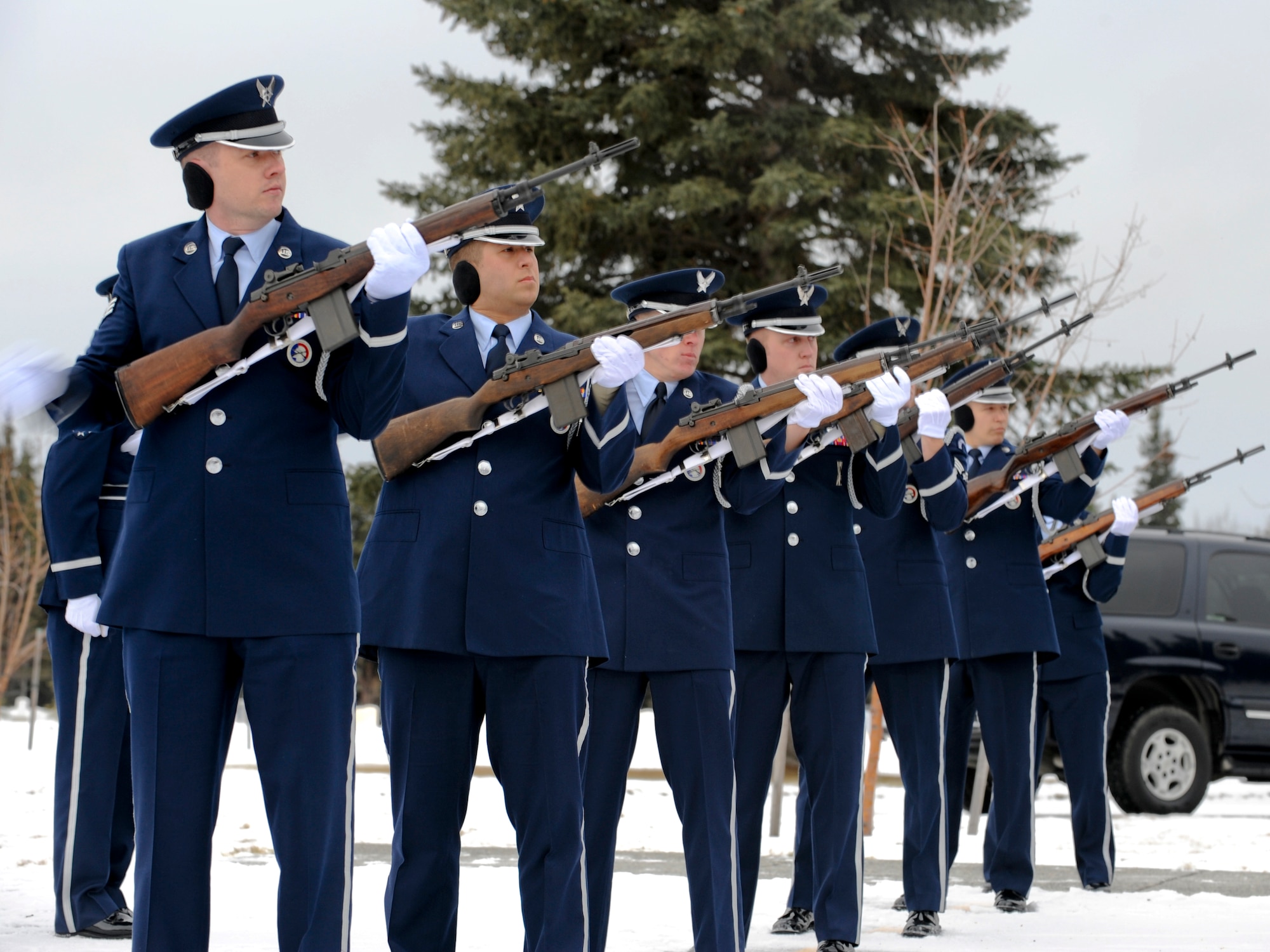 FORT RICHARDSON, Alaska -- The Elmendorf Honor Guard executes a 21-gun salute for fallen servicemembers during the Veterans Day Memorial Ceremony at Fort Richardson National Cemetery Nov. 11. The ceremony commemorated all those who paid the ultimate sacrifice for their country as well as those who are still fighting for their country. Air Force alongside Army and Canadian forces were present for the ceremony. (U.S. Air Force Photo/Staff Sgt. Joshua Garcia)