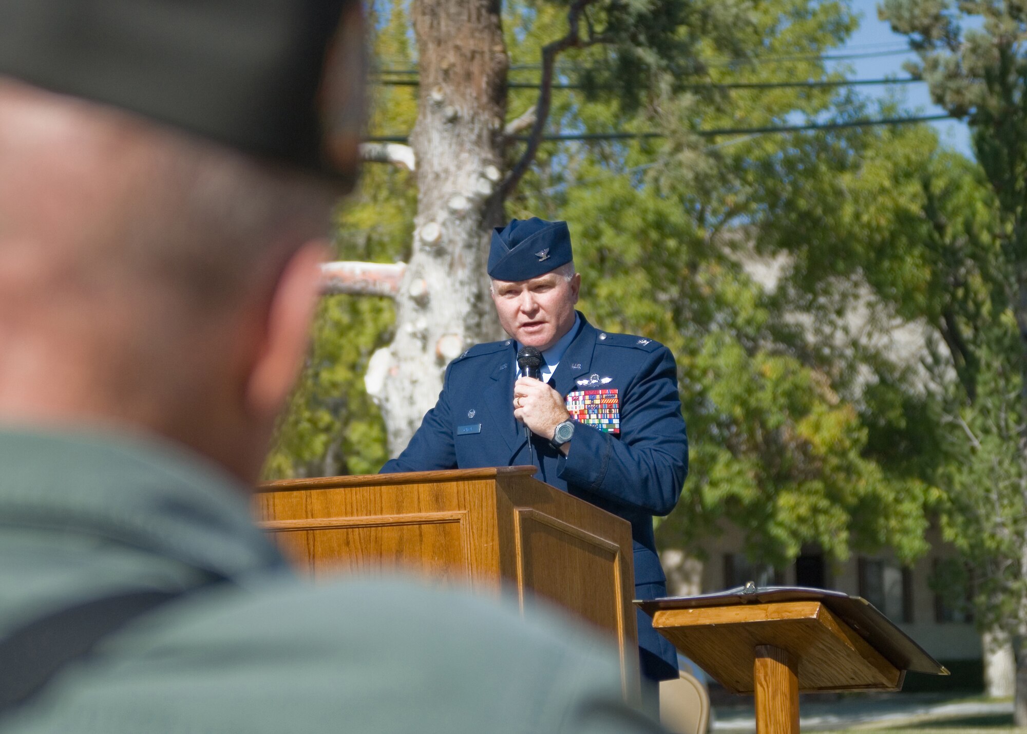 Col. Jerry Gandy, 95th Air Base Wing commander, remembers and thanks all the veterans who have served in times of war and peace during a Veterans Day ceremony at Glendower Park in Rosamond, Calif., Nov. 11. Chief Master Sgt. Eric Jaren, 95th ABW command chief, who also attended the ceremony, led the audience in reciting the Airman's Creed as they remembered those who've made a covenant with their country so others can live freely. (Air Force photo by Michael Yncera)