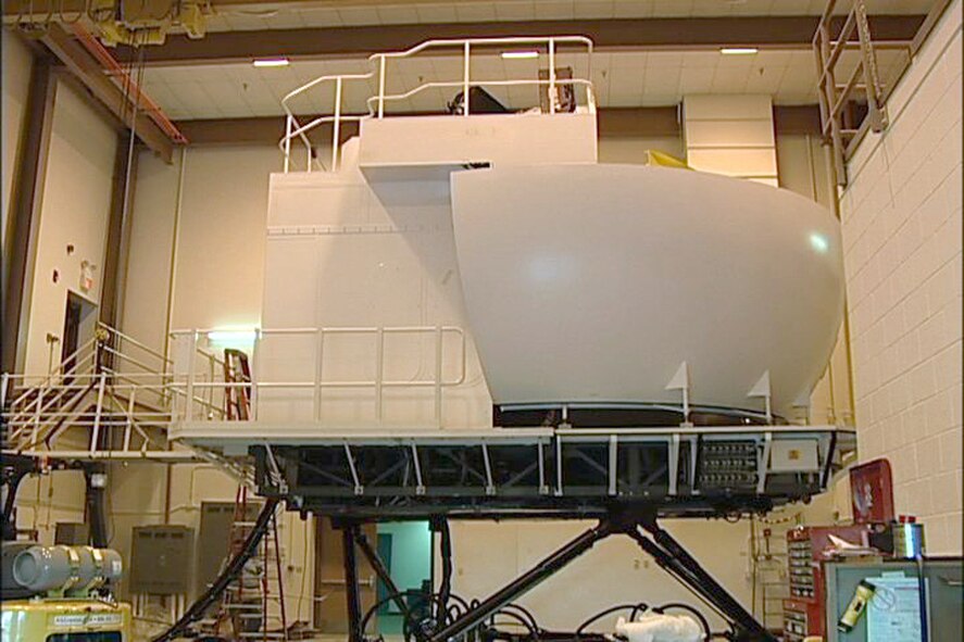 MCCONNELL AIR FORCE BASE, Kan. – McConnell received this KC-135 flight simulator Aug. 22, from Grand Forks Air Force Base, N.D., which is currently undergoing a realignment of its tanker mission. The base had two KC-135 flight simulators before receiving the additional sim. McConnell is the largest KC-135 pilot training location, next to Altus Air Force Base, Okla., where KC-135 pilots attend initial flight training. (Photo by Senior Airman Nicholas Stowers) 