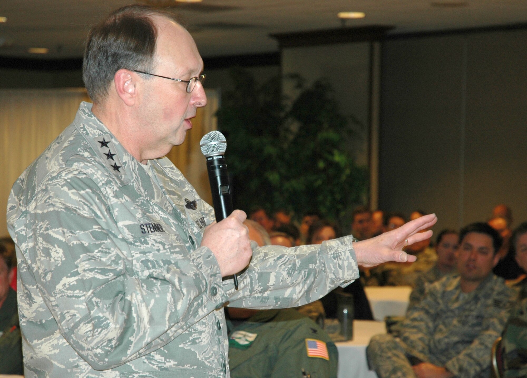 Lt. Gen. Charles Stenner, Jr., speaks with members of the 302nd Airlift Wing during a town hall question-and-answer session Nov. 12 at the Peterson Air Force Base club in Colorado. General Stenner, commander of the Air Force Reserve, visited the base to gain a better understanding of the wing and its sister unit, the 310th Space Wing, based at Schriever AFB, Colo. General Stenner was also given a demonstration on the airlift wing's modular airborne firefighting system, or 'MAFFS' unit. The unit is used in wild land firefighting missions when called up to support state officials in the U.S. when all other firefighting methods have been exhausted. (U.S. Air Force photo/Ann Skarban)