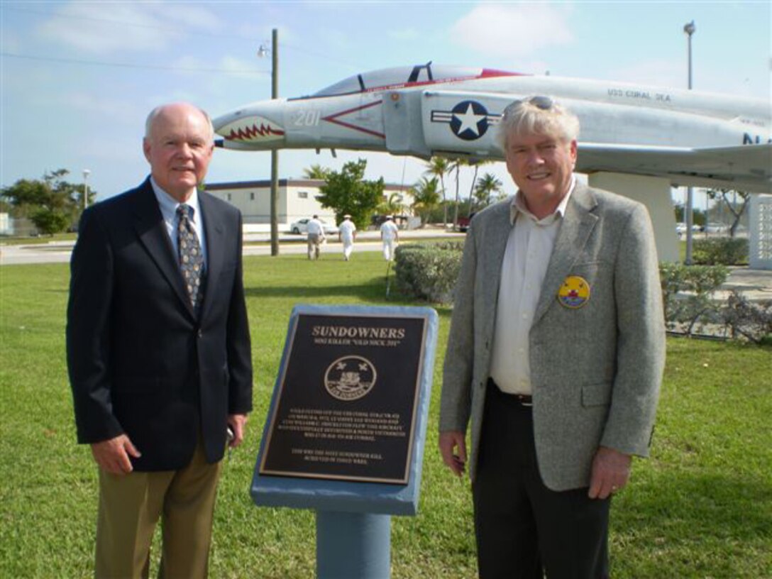 Bill Freckleton (right) poses for a photo with Gary Weigand during a dedication ceremony of a VF-111 Sundowners F-4 Phantom, which Mr. Freckleton and Mr. Weigand used to shutdown a North Vietnam MiG-17 during Vietnam War. Mr. Freckleton is a 412th Range Squadron range control officer assigned to the F-22 Raptor Combined Test Force. (Courtesy photo)