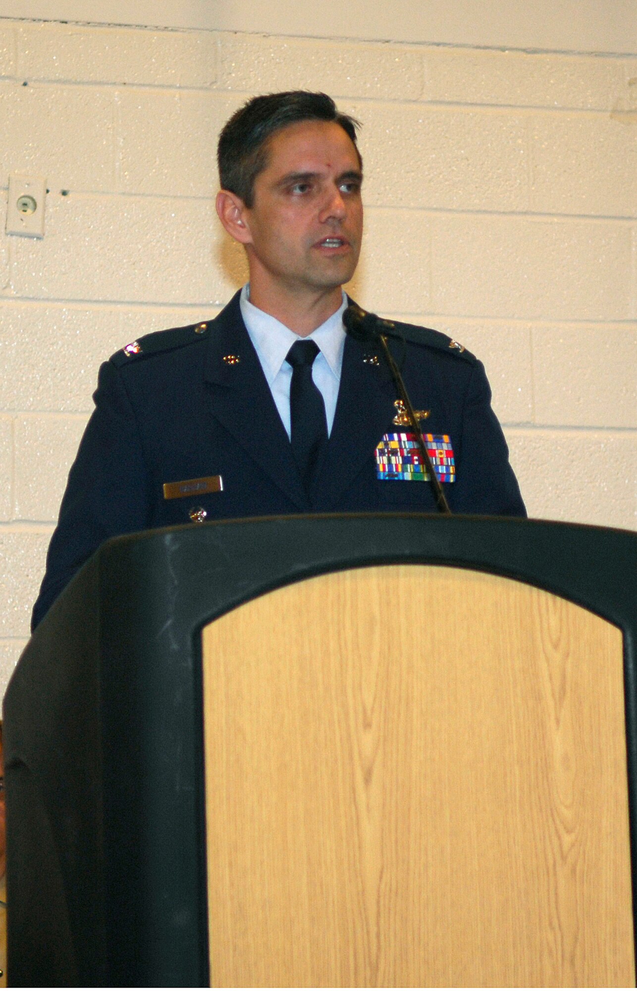 MINOT AIR FORCE BASE, N.D. – Col. Steven Basham, 5th Bomb Wing vice commander, addresses the audience during Minot’s Veterans Day program held at the Minot Municipal Auditorium  here Nov. 11. Minot’s program, which is an annual event, was organized by Disabled American Veterans Chapter 4, in conjunction with other veterans organizations and auxiliaries, and included the Minot High School-Magic City Campus Band performing the national anthem, a salute to the armed forces, and a special patriotic selection called “Missing Man.” Colonel Basham was one of several Airmen from Minot Air Force Base to volunteer as guest speakers during Veterans Day ceremonies around the surrounding area. (U.S. Air Force photo by Senior Airman Joe R. Rivera Jr.)