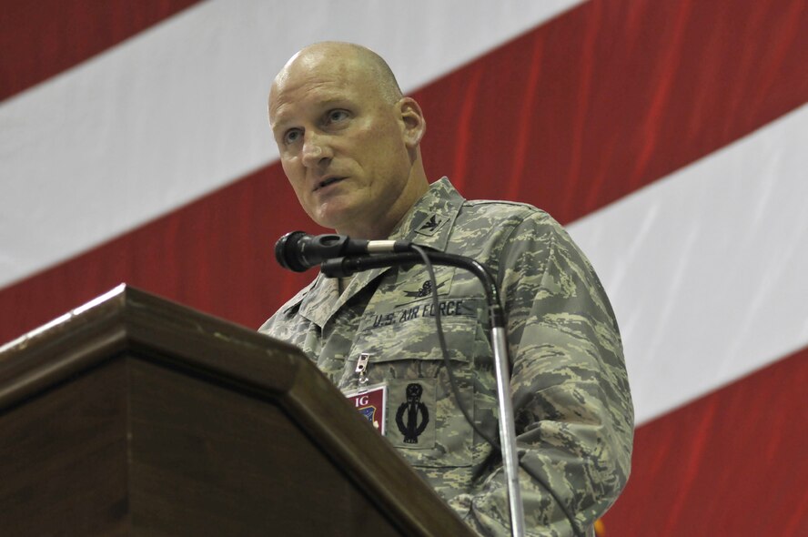 Col. Scott Gilson, Air Force Space Command Inspector General, addresses the members of the 341st Missile Wing during the inspection out brief in the 3-Bay Hangar Nov. 10. Colonel Gilson and his team of more than 90 inspectors were at Malmstrom Oct. 26 through Nov. 10 to conduct Nuclear Surety and Operational Readiness Inspections. (U.S. Air Force photo/John Turner)