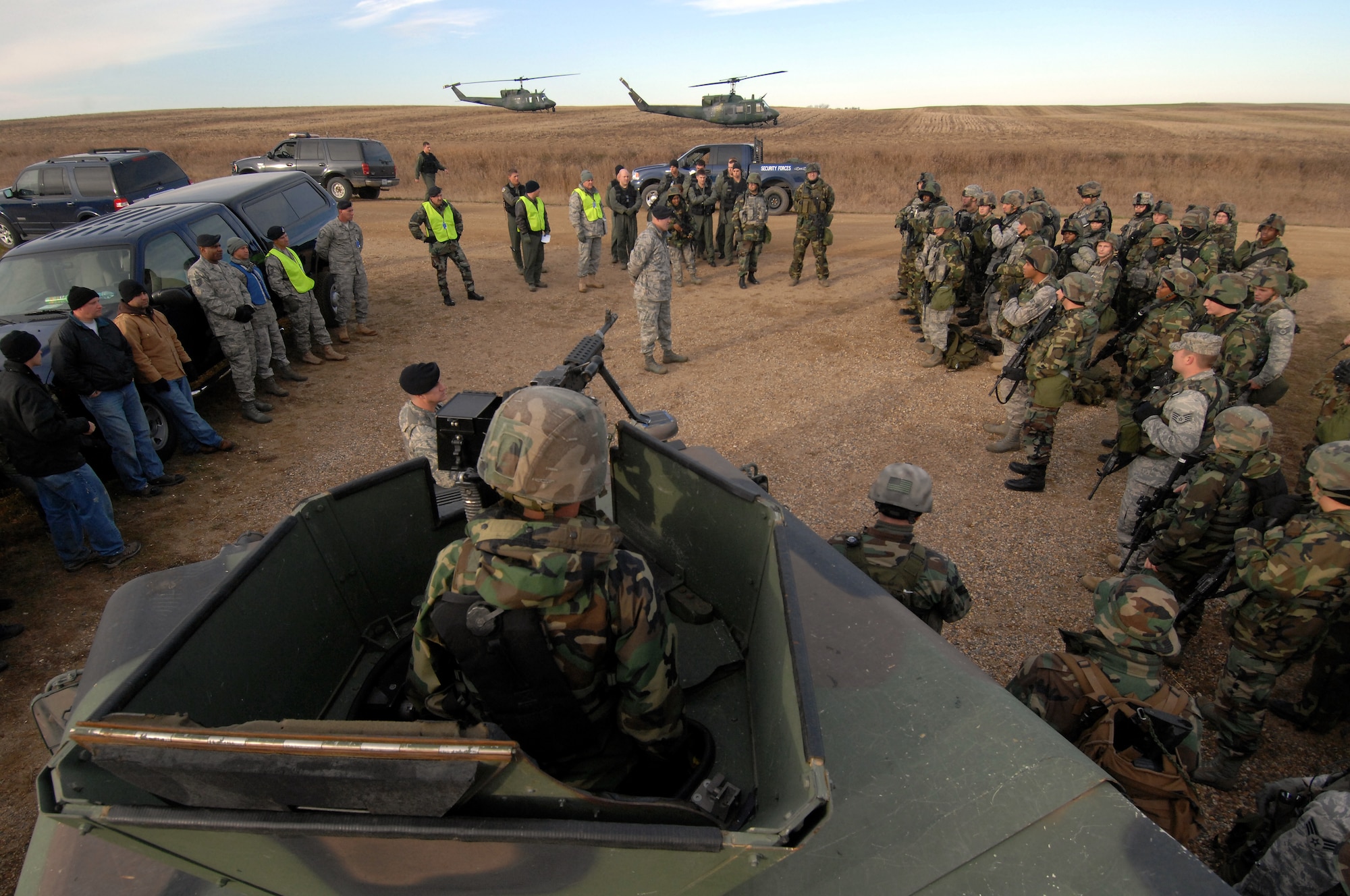 MINOT AIR FORCE BASE, N.D. - Members of the 91st Security Forces Group receive an operations debrief at the conclusion of a recapture and recovery exercise at a launch facility Oct. 24. The exercise was part of the Twentieth Air Force Combat Capability Evaluation that took place over a period of 10 days and consisited of evaluations in the fields of technical knowledge, training and evaluator proficiency for the 91st Missile Wing. (U.S. Air Force photo by Senior Airman Kelly Timney)