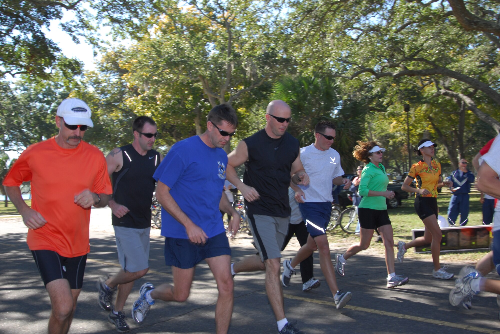 Duathlon participants begin their 1.5 mile run Monday during Sports Day.  Following the 1.5 mile run, participants bike 8 miles and run 1.5 more miles before finishing the race.  (U.S. Air Force photo by Susan Trahan)