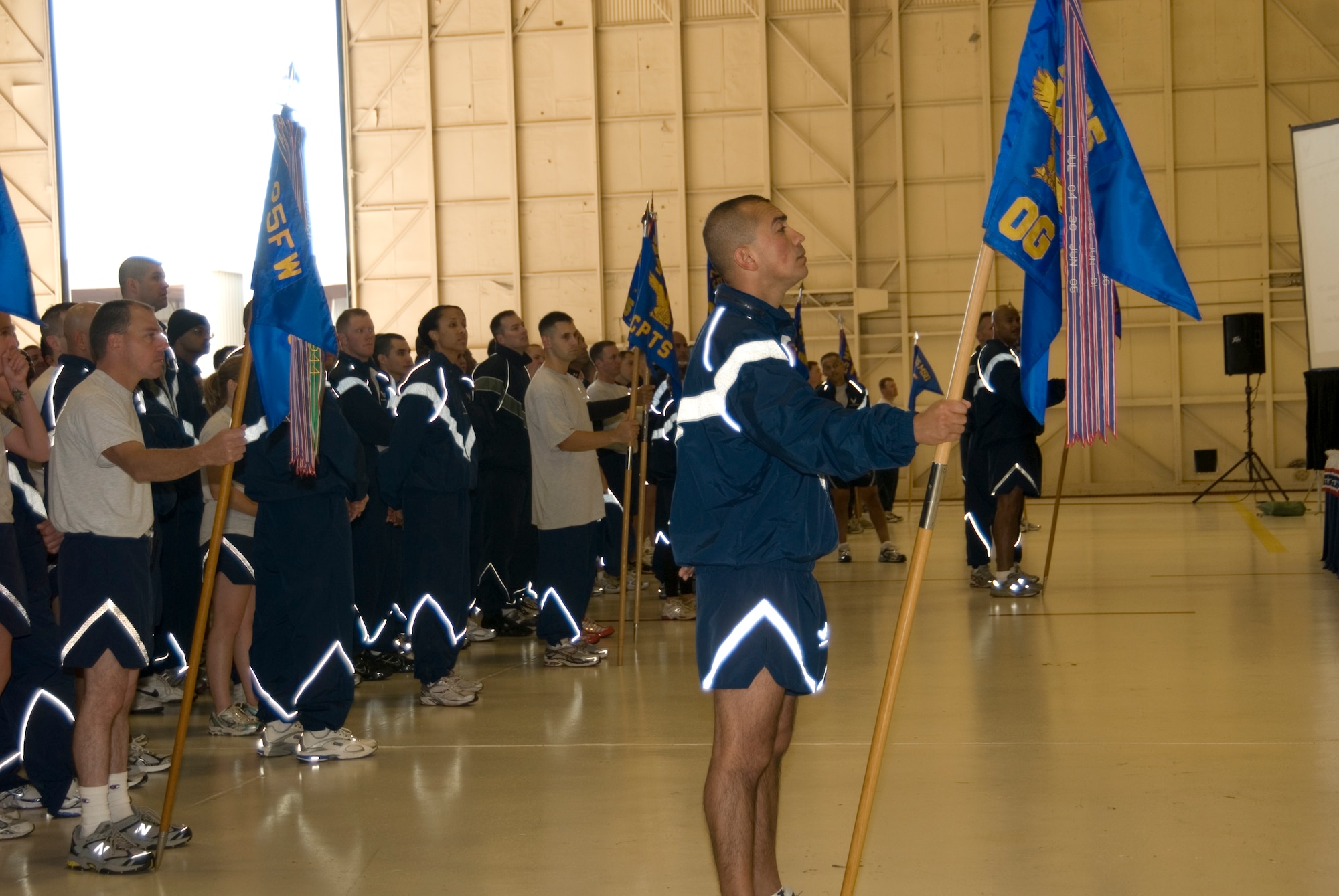 Team Tyndall gathers in Hangar 2 following a wing fun run for a Commander’s Call here Monday.  (U.S. Air Force photo by Susan Trahan)