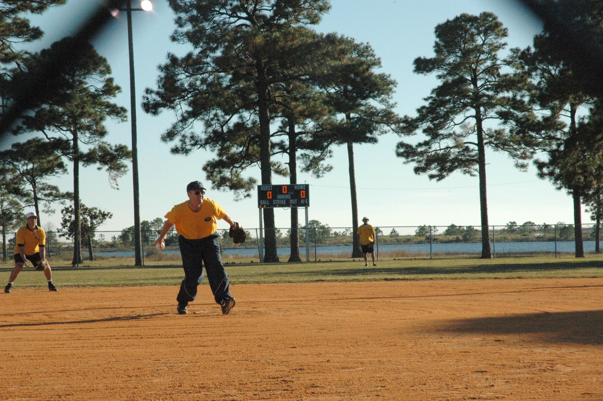 Gen. Darryl Roberson, 325th Fighter Wing commander, delivers the first pitch during the Chiefs vs. Eagles softball game. The game featured Tyndall’s chief master sergeants and first sergeants squaring off against Tyndall’s colonels and lieutenant colonels. (U.S. Air Force photo by Staff Sgt. Vesta M. Anderson)