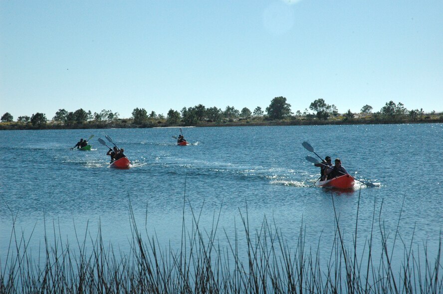 The Kayak Race, which began at the Heritage Park beach, had three heats of teams square off against each other. First place was claimed by the 43rd Fighter Squadron participants. (U.S. Air Force photo by Staff Sgt. Vesta M. Anderson)