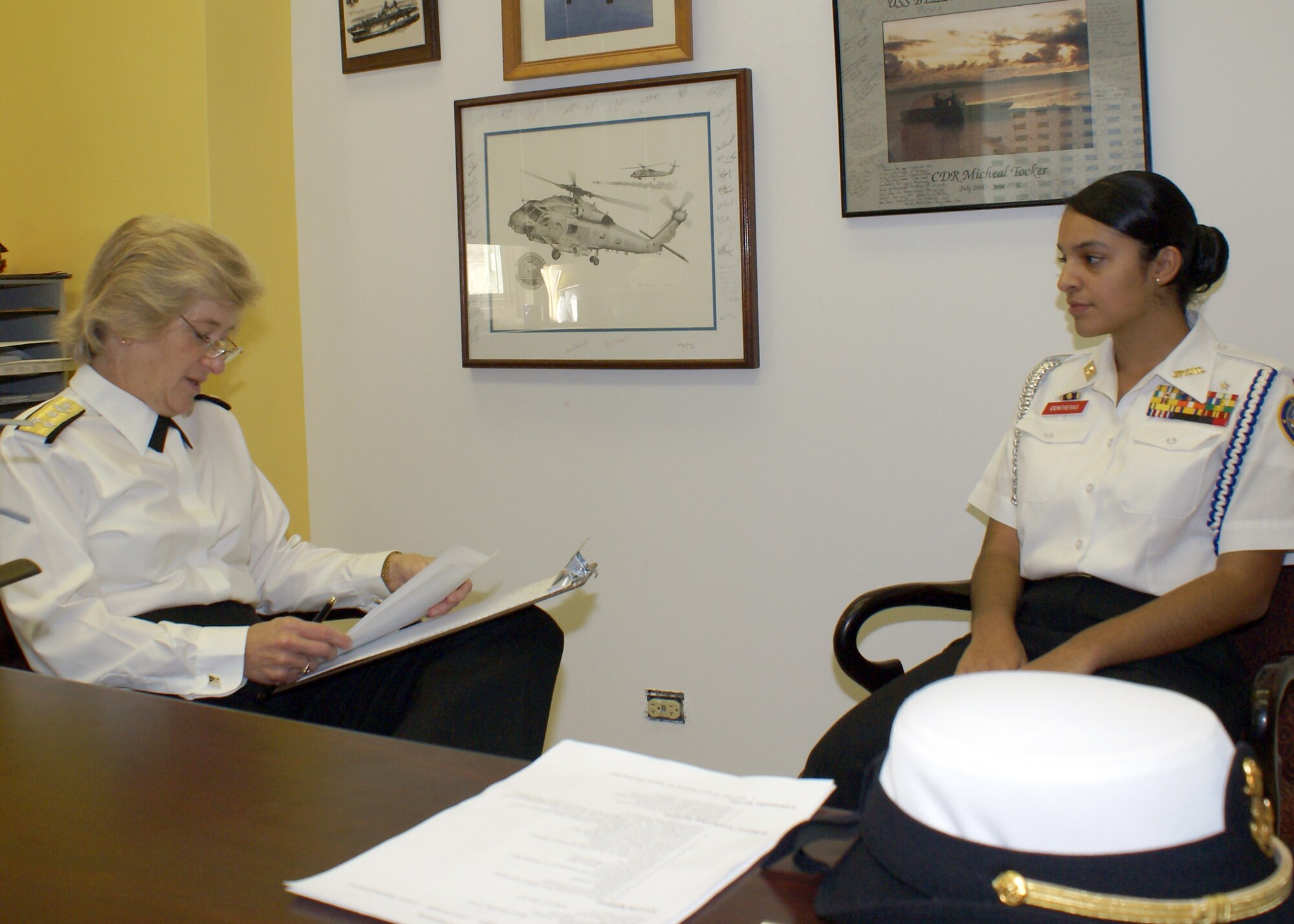 SCOTT AIR FORCE BASE, Ill. -- Vice Adm. Ann E. Rondeau, Deputy Commander, U.S. Transportation Command, conducts an interview with prospective U.S. Naval Academy and Naval Reserve Officer Training Corps candidate cadet Alexis Contreras. Rondeau reviewed Contreras’ academic transcripts and a resume for the top cadet in Chicago’s Corps of Cadets. Chicago has the largest JROTC of cadets in the nation, at approximately 10,000 and Contreras is the No. 1 cadet. (U.S. Navy photo/Lt. Jeffrey S. Gray) 