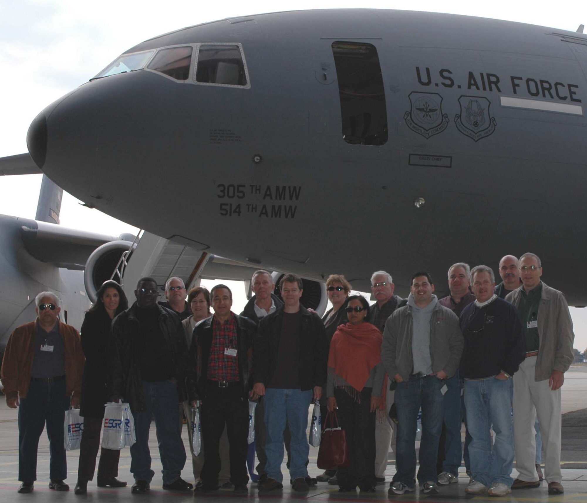 MCGUIRE AIR FORCE BASE, N.J. -- Employers of 514th Air Mobility Wing members pose in front of a KC-10 Extender after their flight during the annual Employer Appreciation Day here. More than 100 employers spent the day learning about the military role of their citizen airmen employee. (U.S. Air Force photo/SrA. William P. O'Neil III)