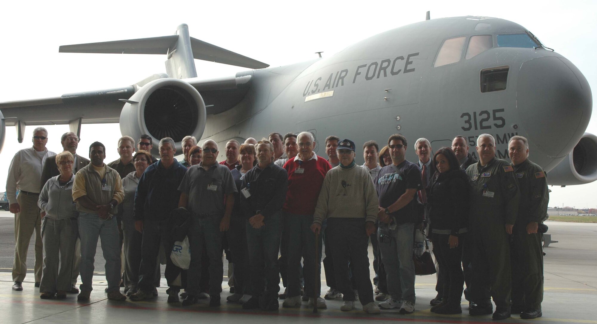 MCGUIRE AIR FORCE BASE, NJ -- Employers of 514th Air Mobility Wing members pose in front of a C-17 Globemaster III after their flight during the annual Employer Appreciation Day here. More than 100 employers spent the day learning about the military role of their citizen airmen employee. (U.S. Air Force photo/ SrA. William P. O'Neil III)  