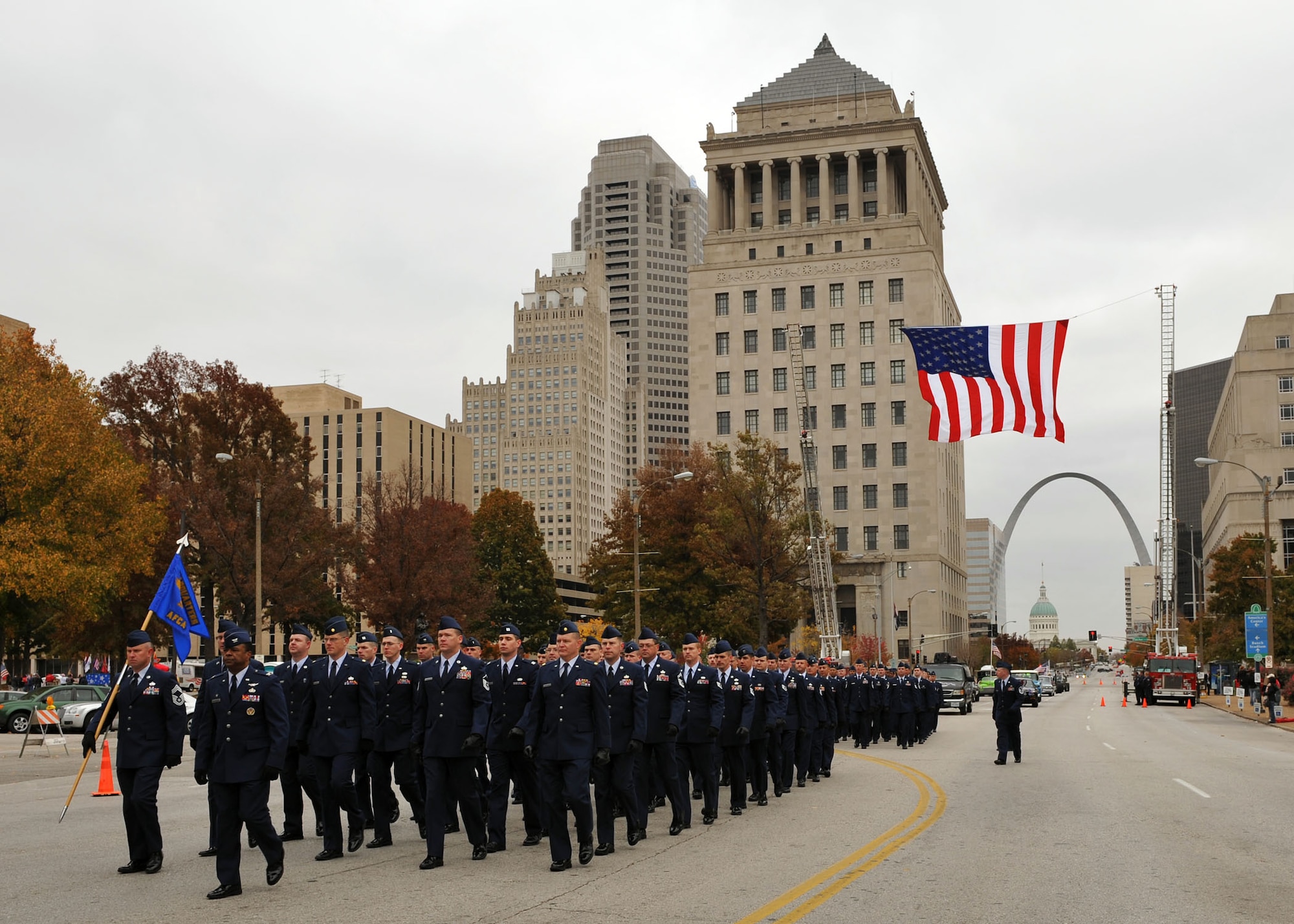 SCOTT AIR FORCE BASE, Ill. -- Officers and Airmen representing the Air Force Communications Agency and Scott marched in the annual Veteran's Day parade held in downtown St. Louis, Saturday. This was just one of the many Veteran's Day observances Scott personnel took part in all over the St. Louis metro area. (U.S. Air Force photo/Airman 1st Class Megan Gilliland) 