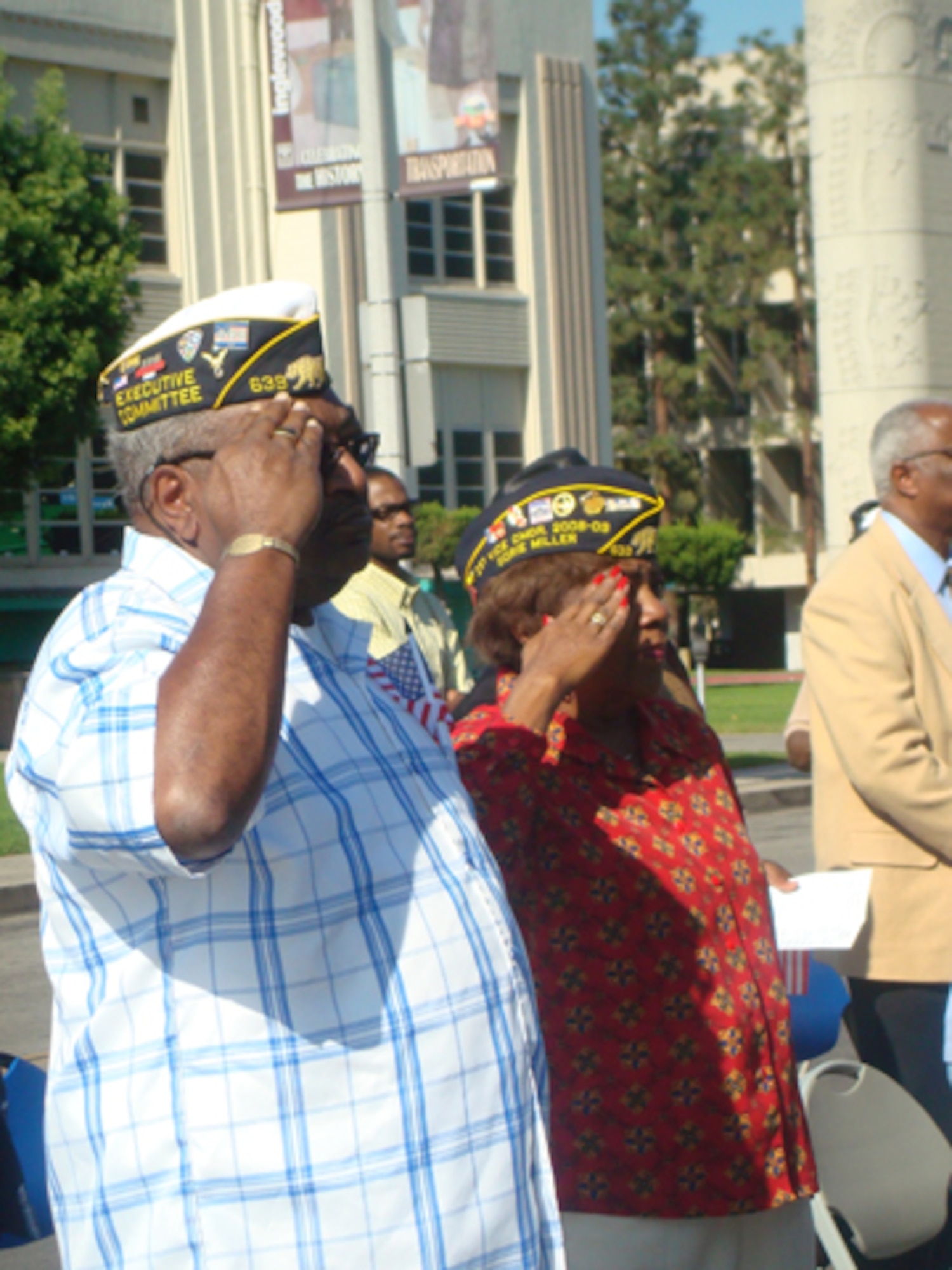 Veterans salute during the posting of the colors at Inglewood’s Veterans Day tribute, Nov. 11. Lt. Col. Ken Bowling, Missile Defense Systems Group, was the keynote speaker at the event. (Photo by Alicia Garges)
