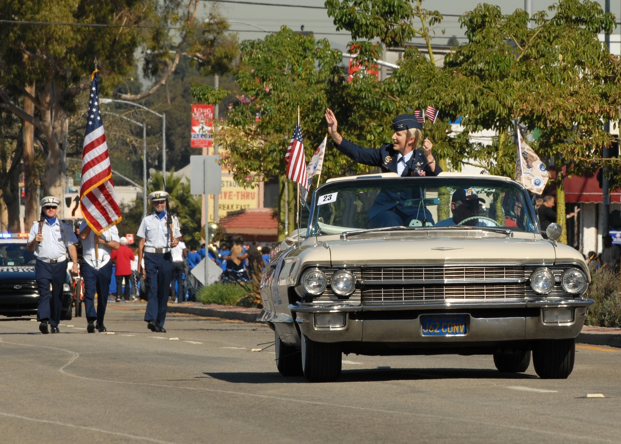 Col. Anita Latin, 61st ABW commander, was the military grand marshal at the Long Beach Veterans Day Parade, Nov. 8. A flyover by an C-17 aircraft from March ARB kicked off the parade, which included local dignitaries, marching bands and veterans groups. (Photo by Stephen Schester)