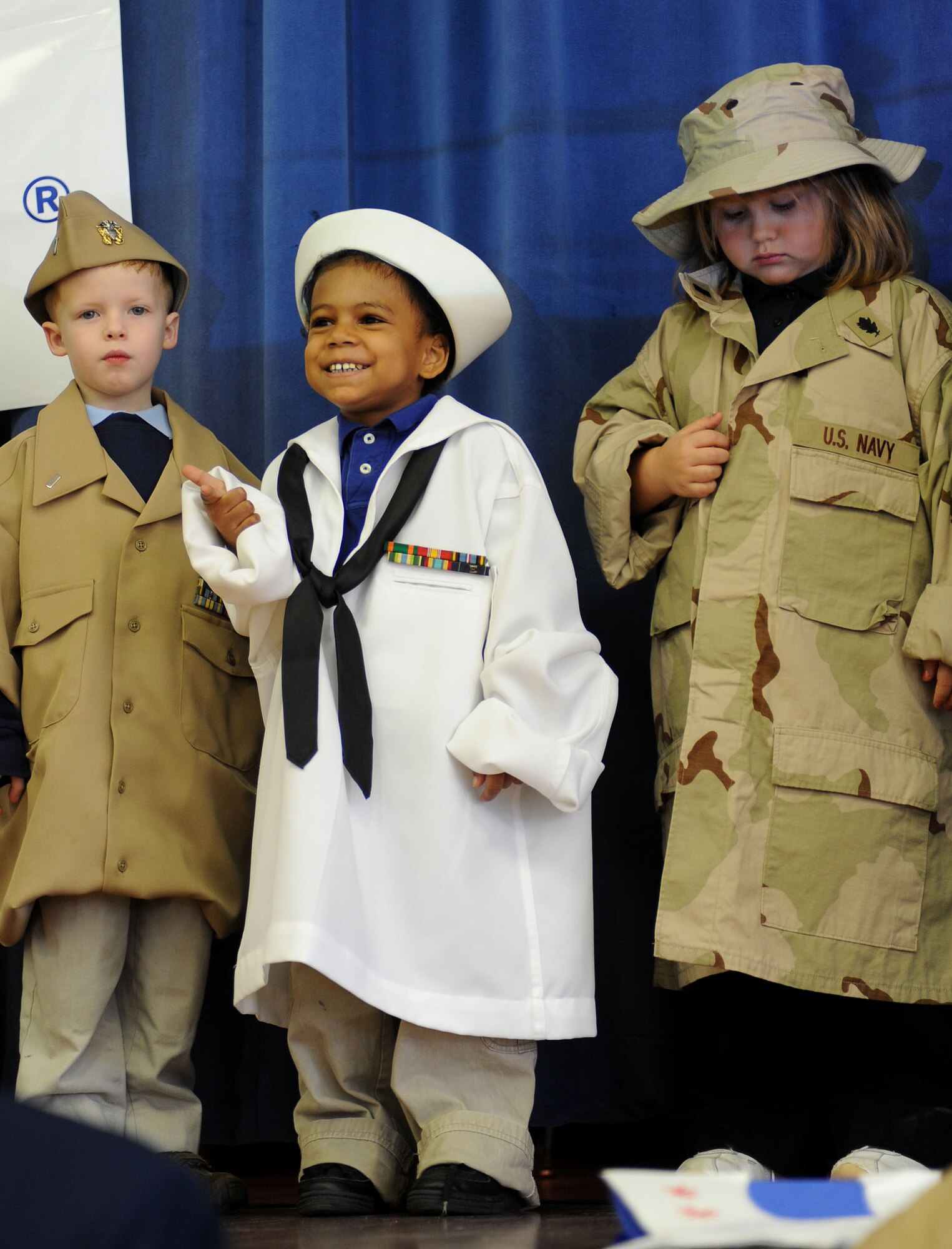 LANGLEY AIR FORCE BASE, Va.-- Second graders dressed as servicemembers greet the crowd during "Take a Veteran to School Day" at Jane H. Bryan Elementary School Nov. 11. The event gave Hampton school children a chance to meet and honor local servicemembers and veterans. (U.S. Air Force photo/Airman Rebecca Montez)