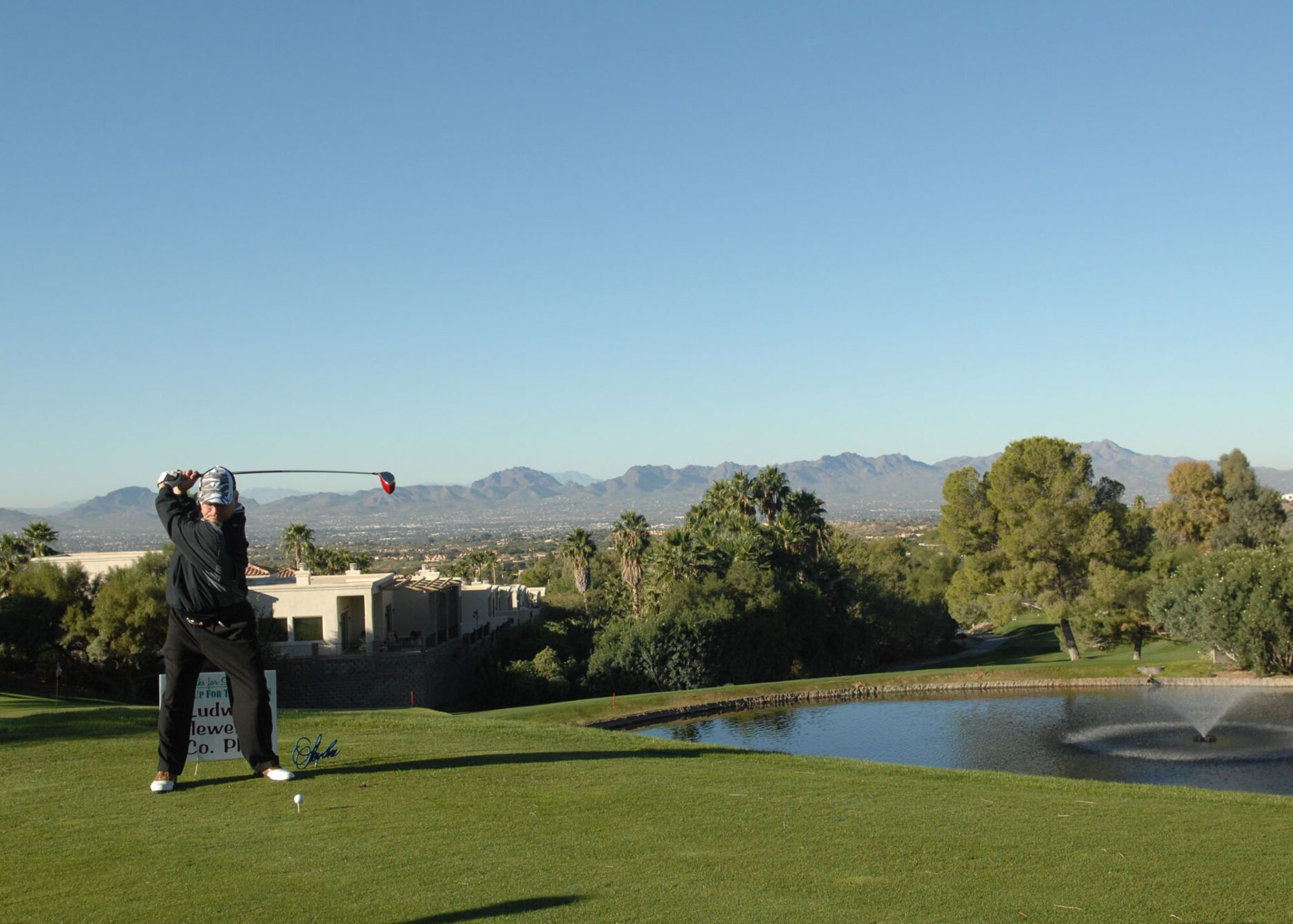 A golfer tees off at the Skyline Country Club golf course during Tee It Up for the Troops November 8.  Tee it up for the Troops, Inc. is a non-profit organization created to help support the fallen and disabled members of our Armed Forces, and their families. Skyline Country Club has invited D-M Airmen to play in the tournament annually since 2006.  Last year, the TIUFTT Tournament raised $72,000 that went to the Wounded Warrior Program, the Fisher House and Tucson Community Cares.  (U.S. Air Force photo by Senior Airman Alesia Goosic) 