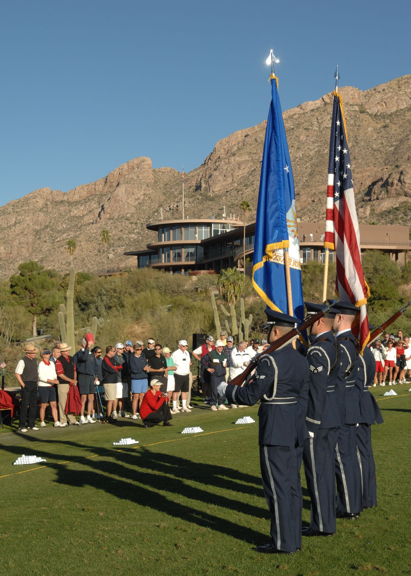 The Davis-Monthan Air Force Base Honor Guard presents the colors at the Skyline Country Club during the opening ceremonies for Tee It Up for the Troops November 8.  Tee it up for the Troops, Inc. is a non-profit organization created to help support the fallen and disabled members of our Armed Forces, and their families. Skyline Country Club has invited D-M Airmen to play in the tournament annually since 2006.  Last year, the TIUFTT Tournament raised $72,000 that went to the Wounded Warrior Program, the Fisher House and Tucson Community Cares.  (U.S. Air Force photo by Senior Airman Alesia Goosic) 