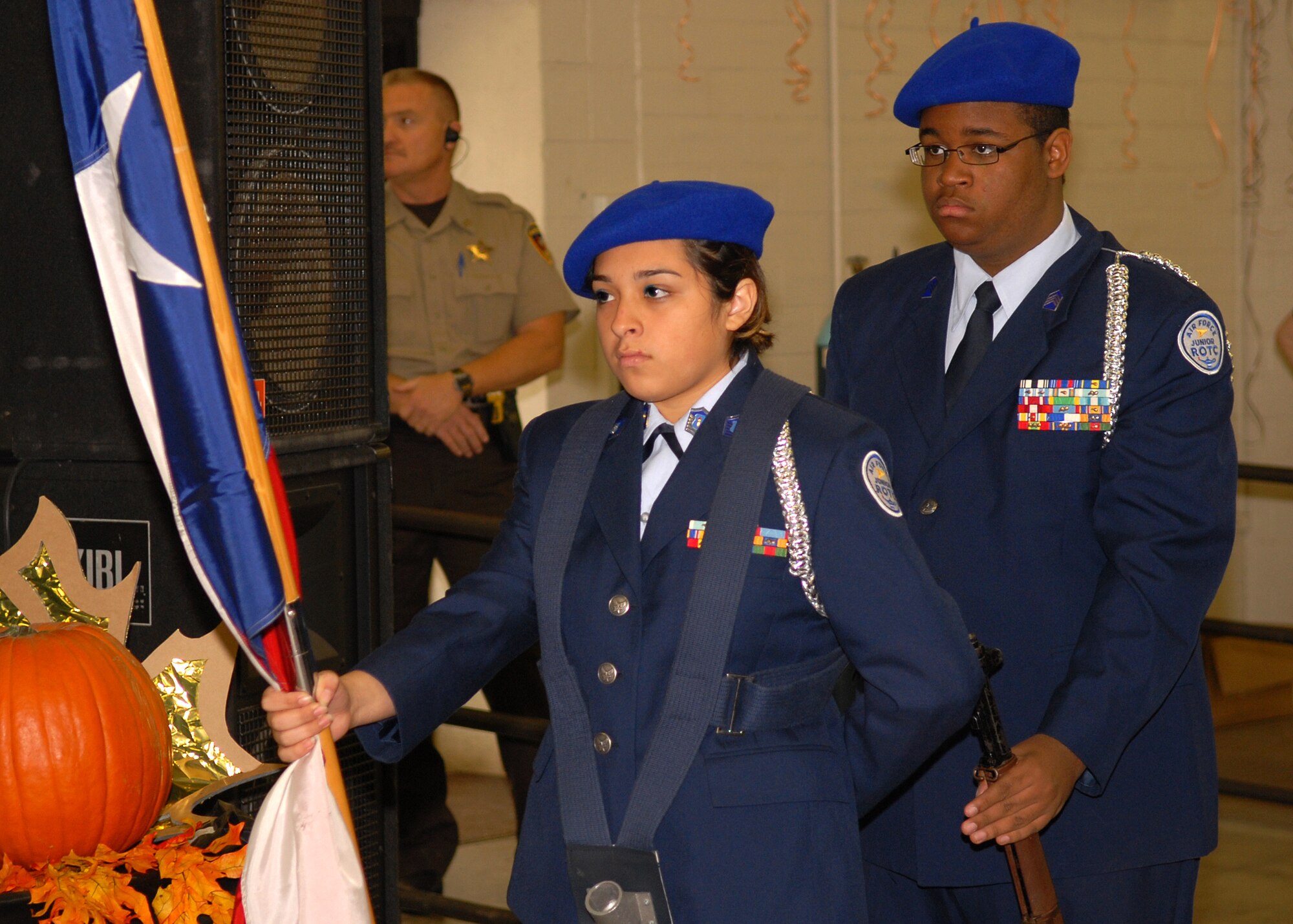 Members of the Lake View High School Junior Reserve Officer Training Corps prepare to post the colors at the annual H-E-B Feast of Sharing at the Wells Fargo Pavilion in San Angelo on Nov.9.  (U.S. Air Force photo by Senior Airman Kasabyan Musal).
