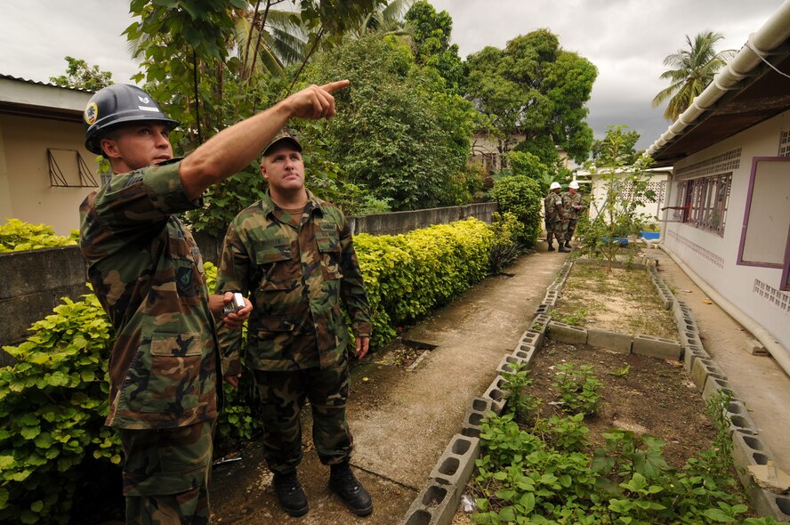 TUNAPUNA, Trinidad and Tobago -- Staff Sgt. Scott Boucher, 5th Civil Engineer Squadron structural craftsman, and Navy Chief Steelworker Gerald Wheeler, both embarked aboard the amphibious assault ship USS Kearsarge (LHD 3), conduct a site survey here recently before beginning engineering operations at Cyril Ross Nursery as part of the partnership between Continuing Promise 2008 and Trinidad-Tobago. CP 2008 is a collaborative effort between the United States and partner militaries, non-governmental organizations, and partner-nation support organizations to build strong partnerships that can be called upon in the event of a regional situation requiring cooperative solutions. (U.S. Navy photo by Mass Communication Specialist 3rd Class David Danals)