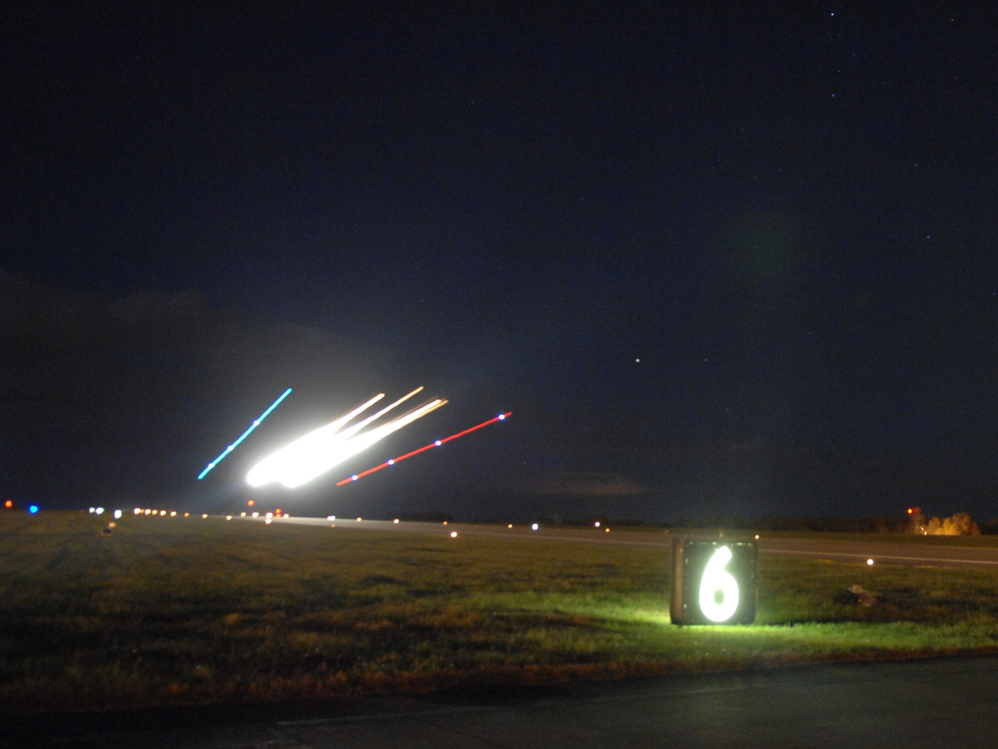 WHITEMAN AIR FORCE BASE, Mo – A B-2 Spirit takes off 45 minutes after sunset Nov. 6. The long exposure the photographer uses shows the path of the B-2 as it takes off. The B-2 is ready around the clock to bring massive firepower to bear, in a short time, anywhere on the globe through previously impenetrable defenses. The B-2 ensures there is no sanctuary for America’s enemies anywhere. (U.S. Air Force photo/Senior Airman Stephen Linch)