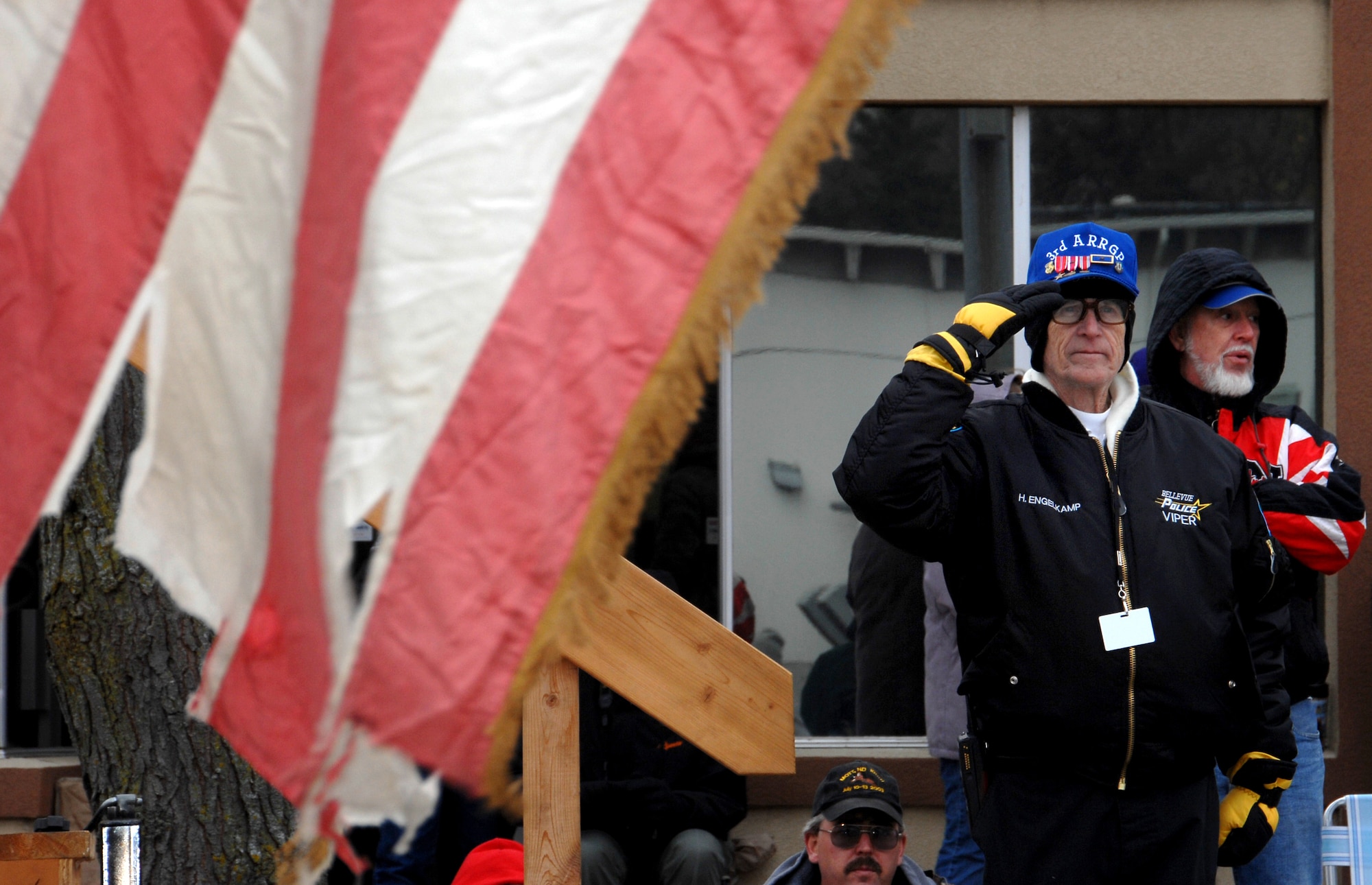 OFFUTT AIR FORCE BASE, Neb. - Retired Master Sgt. Hap Engelkamp, salutes the colors as they make their way down Mission Avenue, Bellevue, Neb., as part of the annual Veterans Day Parade Nov. 8.  More than 400 Offutt members marched in the parade representing U.S. Strategic Command, 55th Wing, Air Force Weather Agency and several other units.

U.S. Air Force Photo by Josh Plueger