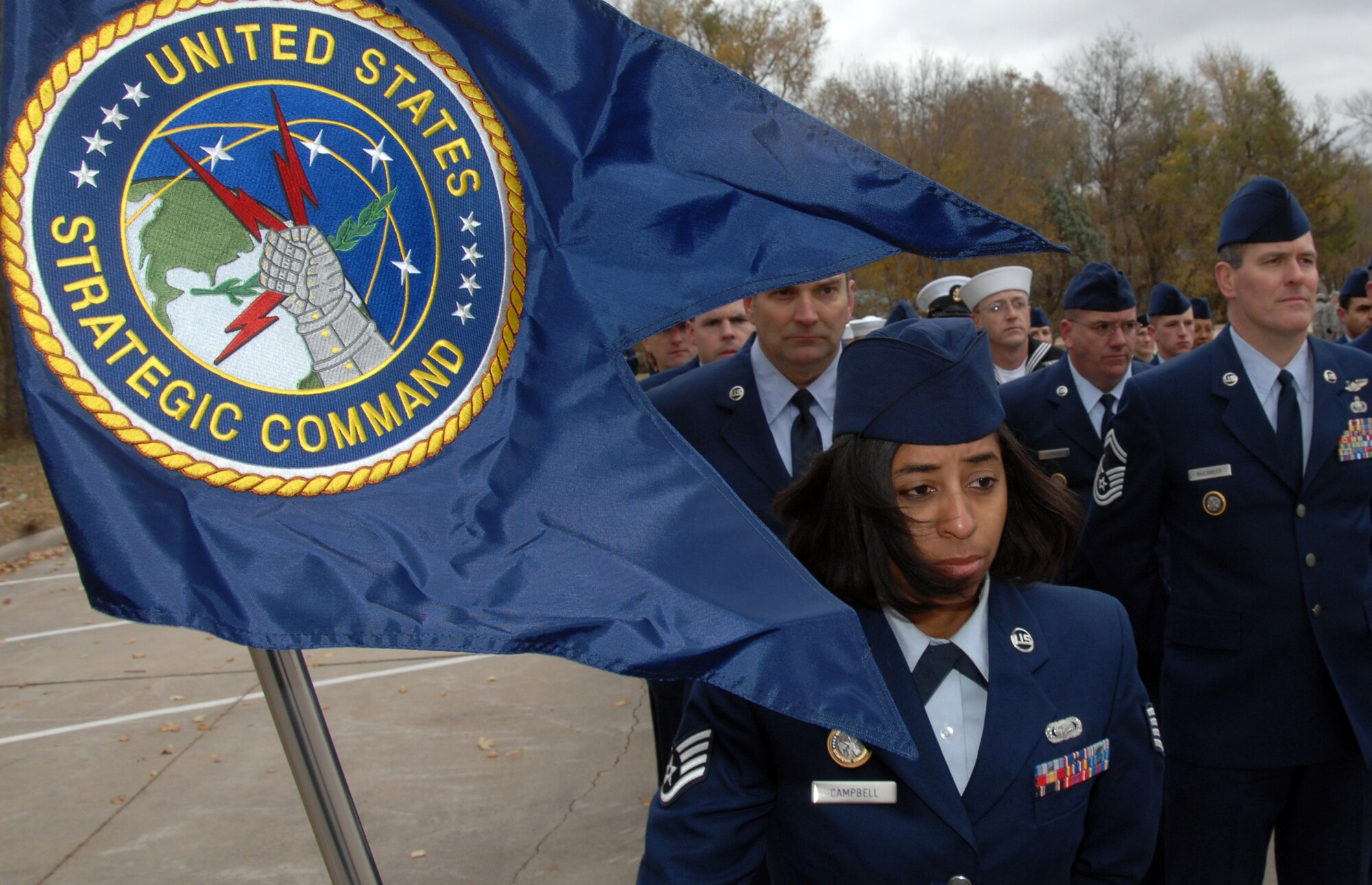 OFFUTT AIR FORCE BASE, Neb.- Staff Sgt Natalie Campbell, with U.S. Strategic Command, stands  with the  United States Strategic Command guidon while waiting to begin the Veterans Day Parade held in Olde Towne Bellevue, Neb., on Nov. 8.  More than 400 Offutt members marched in the 8th annual Veterans Day Parade representing U.S. Strategic Command, 55th Wing, Air Force Weather Agency and several other units.

U.S. Air Force Photo by Josh Plueger