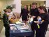 A Health and Wellness Center staff member gives out educational information and fruit during National Nutrition Month in March. The HAWC staff works year-round to spread information about eating healthy and being fit. (U.S. Air Force courtesy photo)