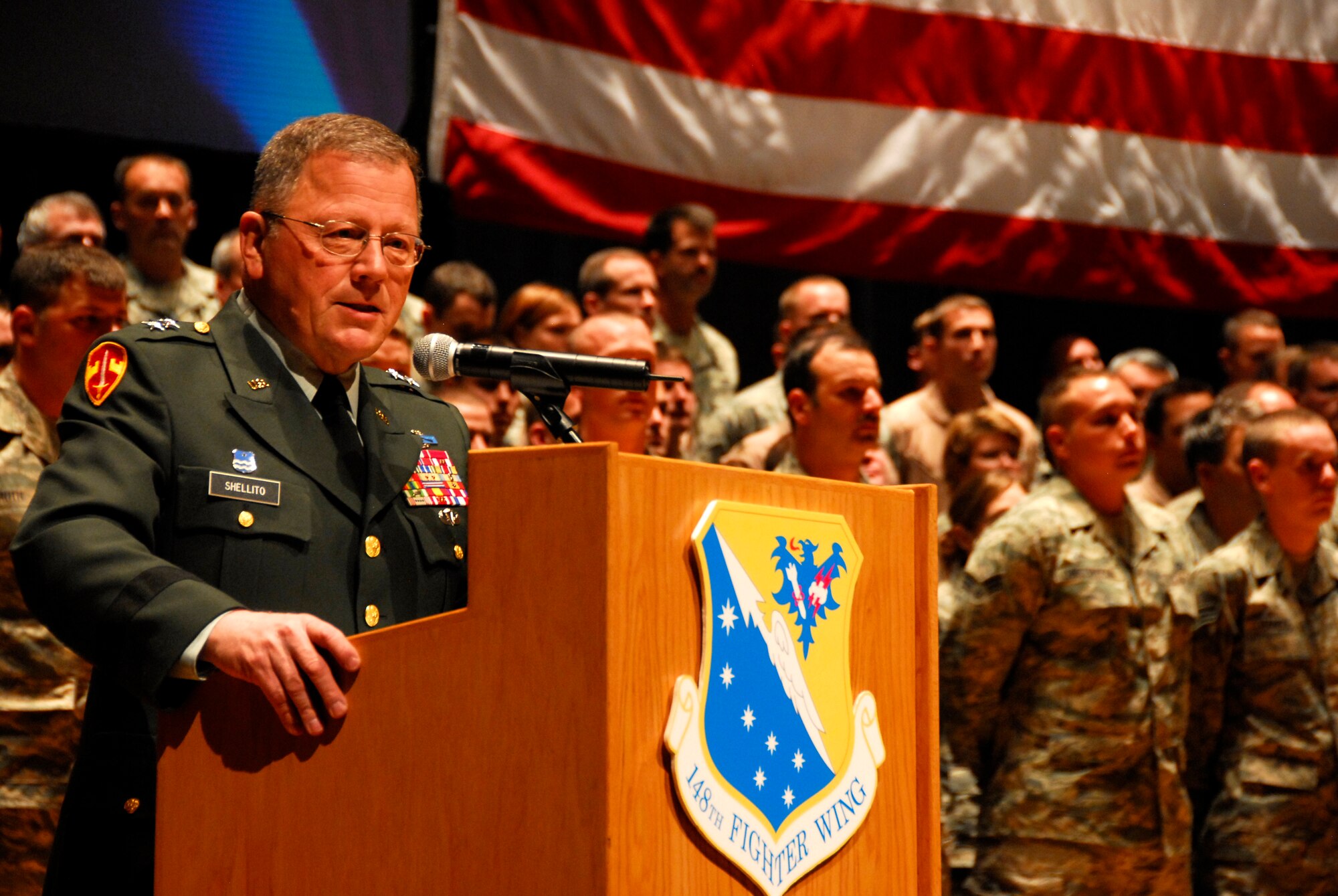 U.S. Army Maj. Gen. Larry Shellito, Adjutant General of the Minnesota National Guard, speaks during a deployment ceremony for the 148th Fighter Wing based in Duluth, Minn. at the Duluth Entertainment and Convention Center Nov. 2, 2008.  Approximately 300 148th Fighter Wing members will deploy overseas in support of Operation Iraqi Freedom and/or Operation Enduring Freedom between Sept 2008 and Jan 2009. (U.S. Air Force photo by SSgt Donald L. Acton) (Released)