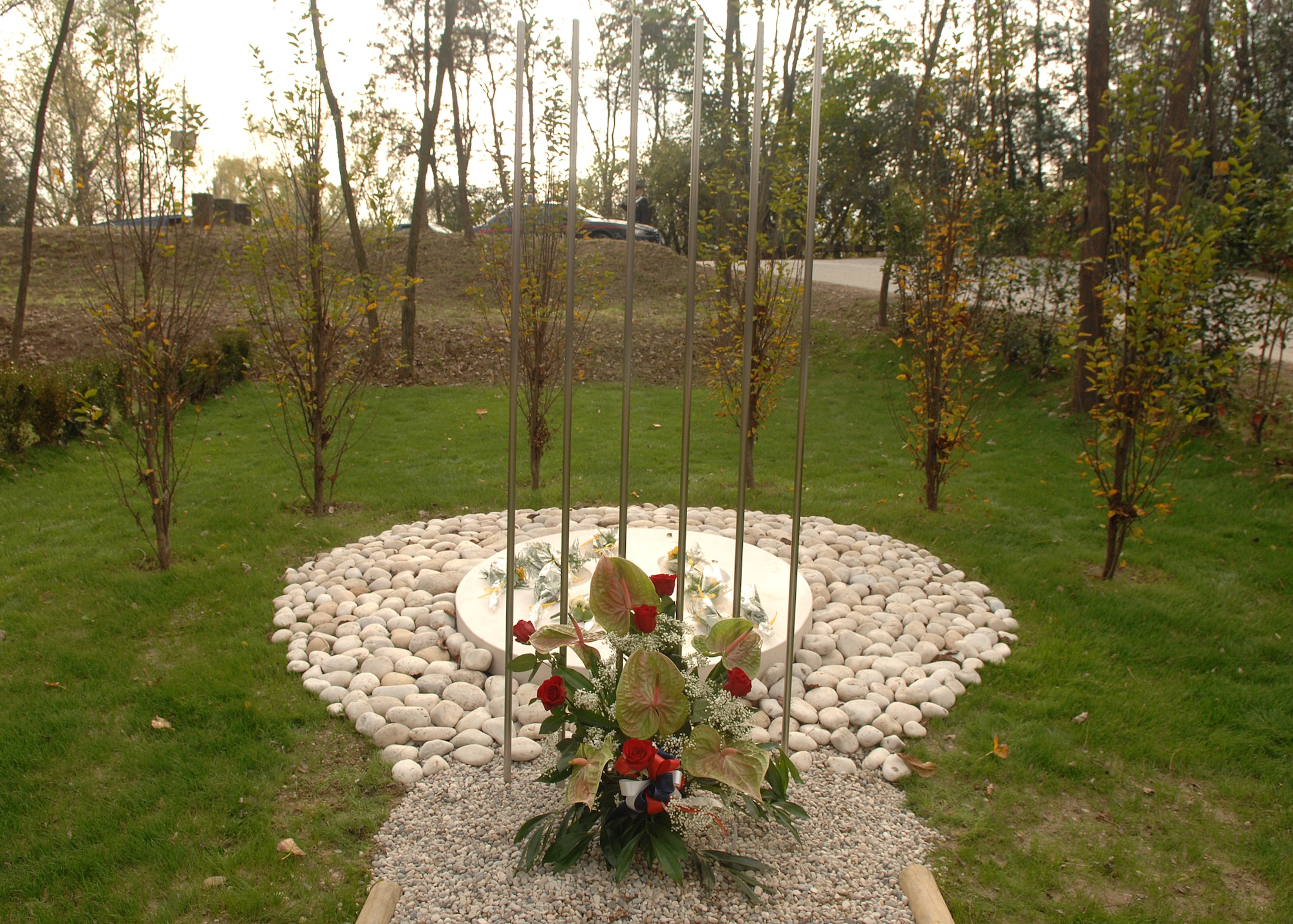 Artist Sonia Tadiotto constructed a memorial site in remembrance of the Nov. 8, 2007 UH-60 Helicopter crash victims of Santa Lucia di Piave, Italy. Members of the Aviano Air Base and Santa Lucia di Piave communities gathered to honor both those vicitms of the crash and the thousands of Italians who lost their lives in the Piave River during World War I on Nov. 8.  (U.S. Air Force photo/Senior Airman Taylor Marr)