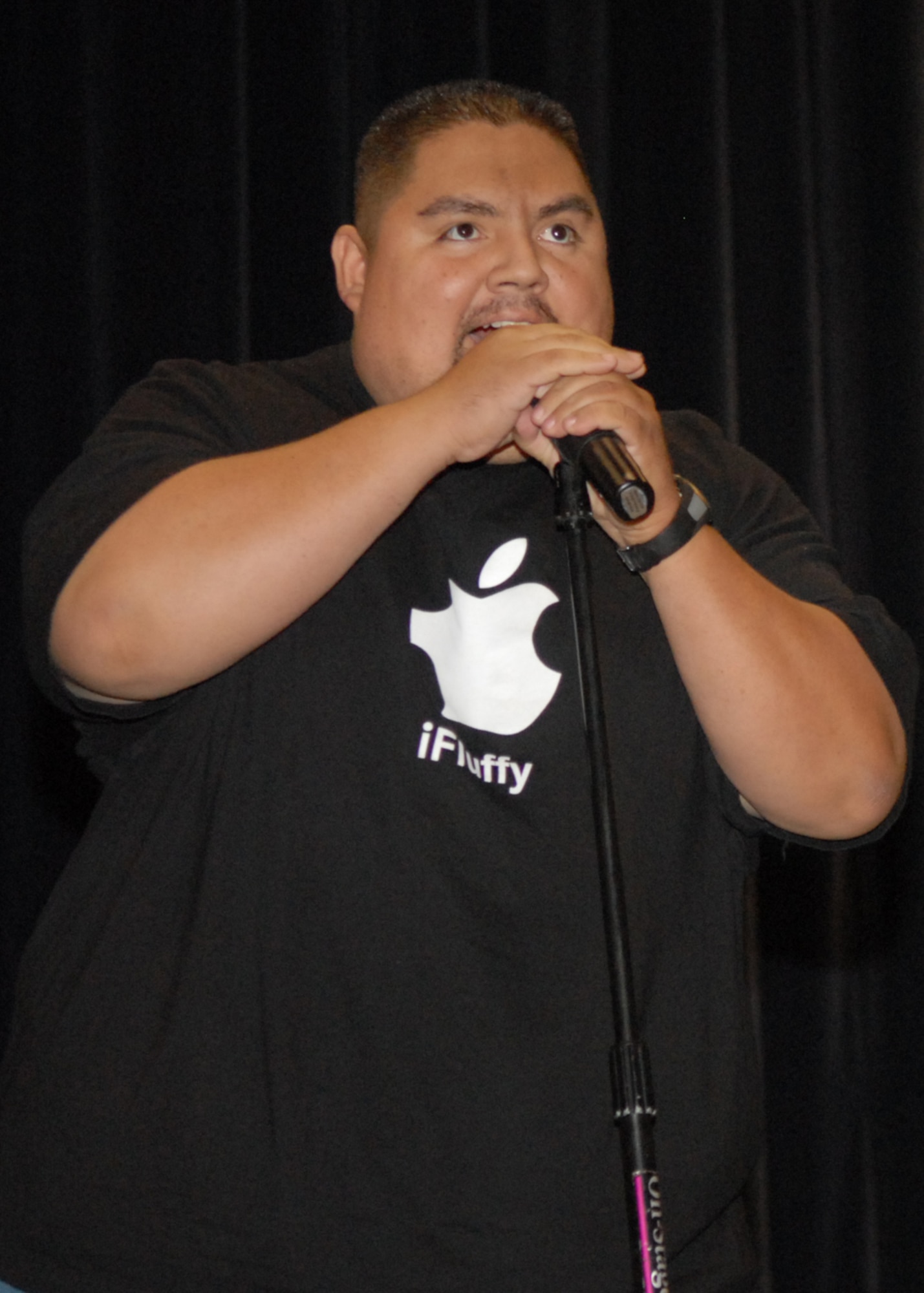 Comedian Gabriel Iglesias takes the stage during the United Service Organization Tour at Kunsan Air Base, Republic of Korea, Novermber 12, 2008. The USO is a private, nonprofit organization whose mission is to support the troops by providing morale, welfare and recreation-type services to servicemembers serving around the world. (U.S. Air Force photo by: Senior Airman Gustavo Gonzalez) 
