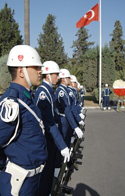 Turkish Air Force members stand at parade rest during the Ataturk Memorial Day Ceremony, Nov. 10, held in front of the 10th Tanker Base Command Headquarters. The ceremony was open to the Turkish and American public. (U.S. Air Force photo by Senior Airman Benjamin Wilson)