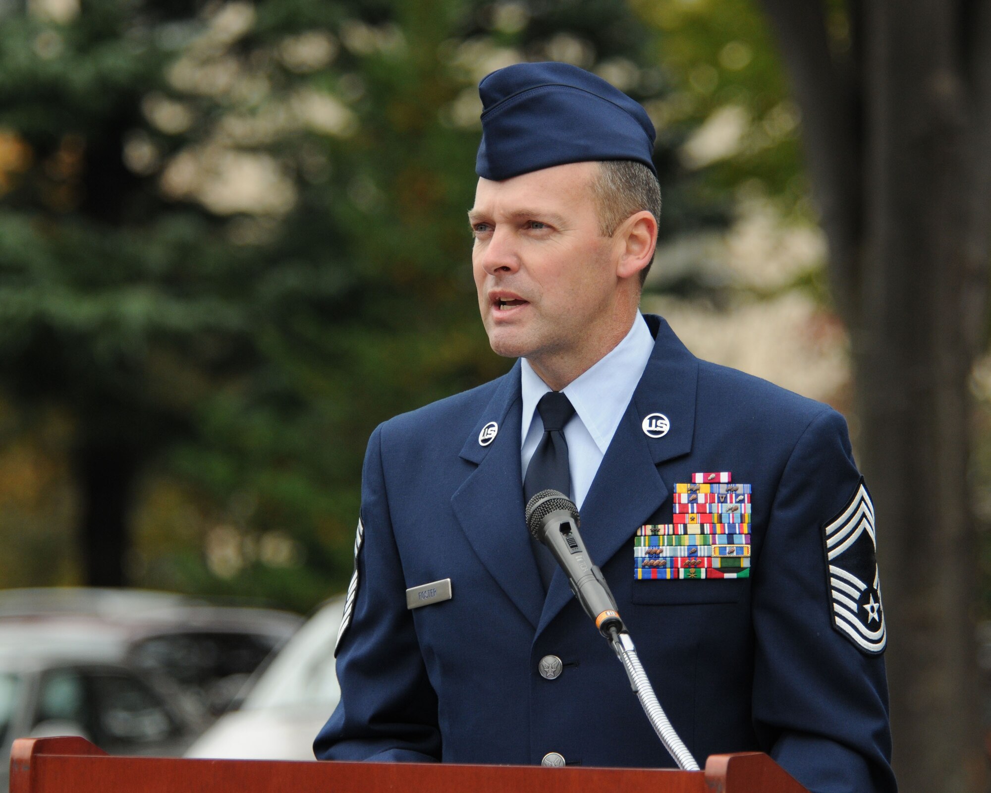 YOKOTA AIR BASE, Japan -- Chief Master Sgt. Donald Foster, from the 374th Logistic Readiness Squadron, speaks to those attending the Veterans Day ceremony hosted by American Legion Post 2222 here Nov. 11. The American Legion's ceremony was one of two conducted on Yokota.  The other was sponsored by the Yokota chapter of the Veterans of Foreign Wars. (U.S. Air Force photo by Senior Airman Brian Kimball)