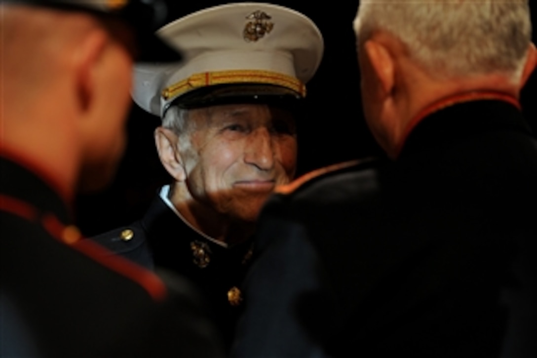 U.S. Marine Corps Chief Warrant Officer Bert Stoller, a World War II veteran born in 1919, is thanked for his service during the Marine Forces Reserve Birthday Ball in New Orleans, La., on Nov. 7, 2008.  Vice Chairman of the Joint Chiefs of Staff Gen. James E. Cartwright, U.S. Marine Corps, was the guest of honor at the ball.  