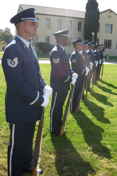 Twenty-seven honor guards graduated recently from the USAFHG Mobile Training Basic Protocol, Honors, and Ceremonies Course hosted by March ARB. Before graduation, students put their new skills to the test by conducting a mock funeral in front of friends, family, co-workers and observers. (U.S. AIr Force photo by Will Alexander)
