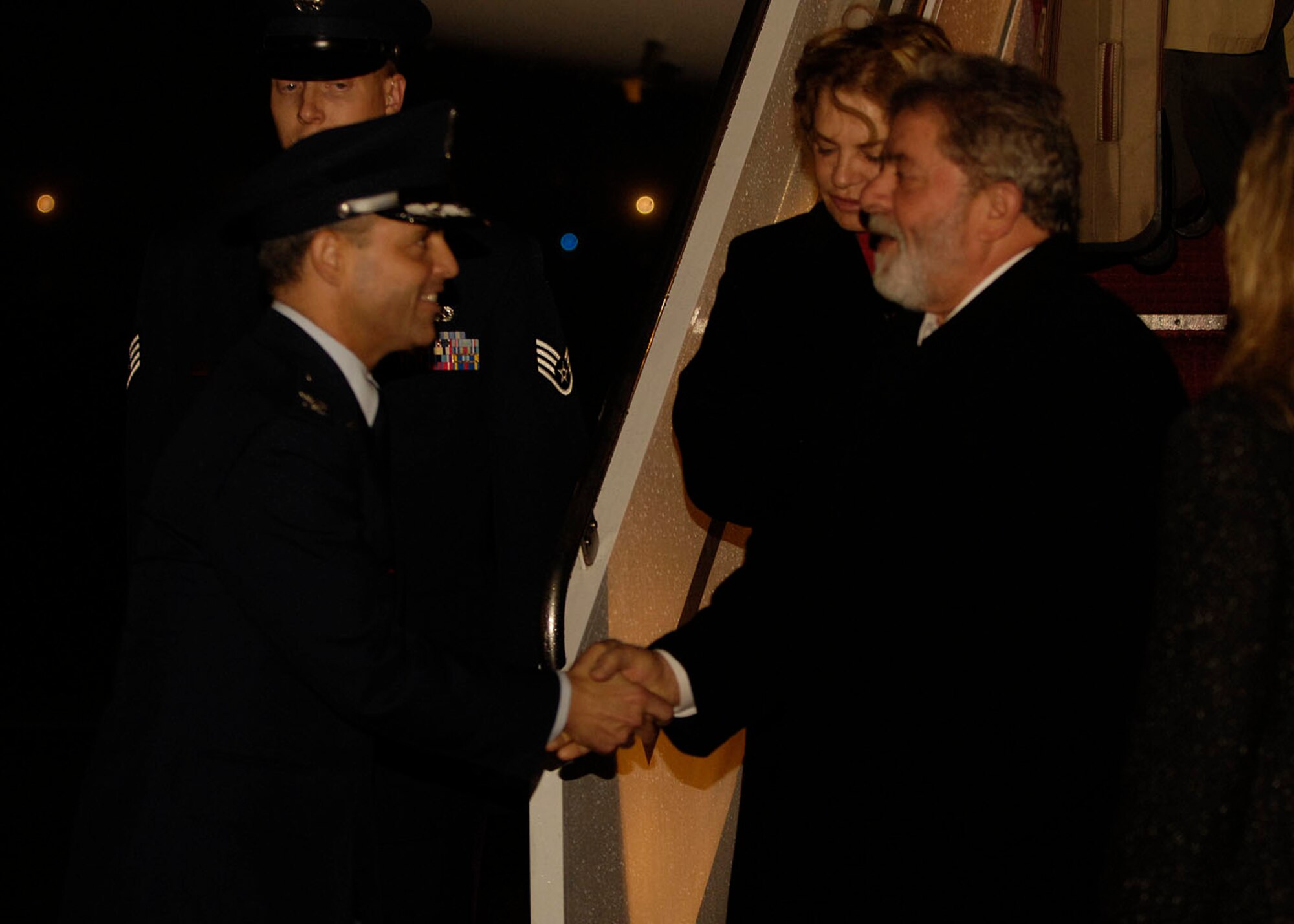 Colonel Eric A. Snadecki, 316th Wing vice commander, greets Brazilian President Luiz Inacio Lula da Silva after landing at Andrews Air Force Base, Md.,  Nov.13, 2008, for the two-day G20 Summit at the White House in Washington. The summit, hosted by U.S. President George W. Bush, will bring together world leaders to discuss the increasing global financial crisis, its causes and efforts to resolve it. (U.S. photo by Senior Airman Steven R. Doty)
