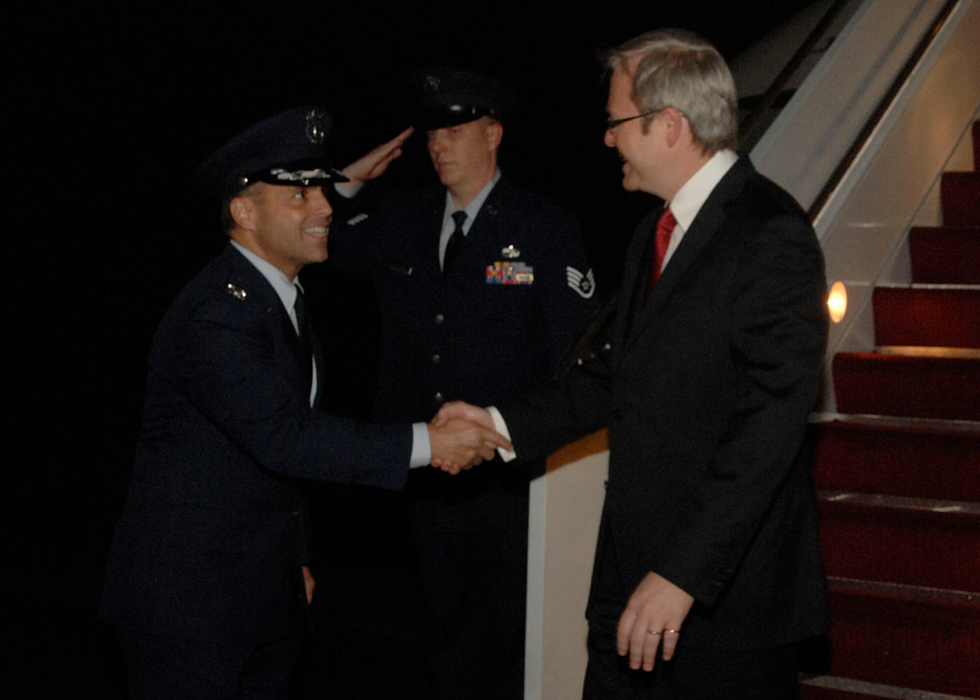 Colonel Eric A. Snadecki, 316th Wing vice commander, greets Australian Prime Minister Kevin Rudd after landing at Andrews Air Force Base, Md., Nov.13, 2008, for the two-day G20 Summit at the White House in Washington.  The summit, hosted by U.S. President George W. Bush, will bring together world leaders to discuss the increasing global financial crisis, its causes and efforts to resolve it. (U.S. Air Force photo by Airman 1st Class Melissa V. Rodrigues)