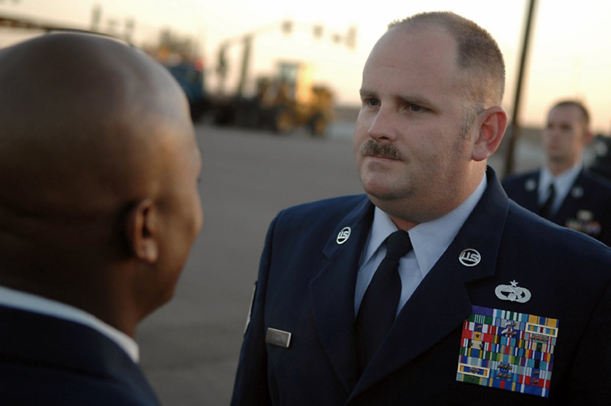 Tech. Sgt. Jerome Baker stands in formation with the rest of his unit during a uniform inspection in October at Luke Air Force Base, Ariz. He is the 56th Logistics Readiness training NCO. (U.S. Air Force photo/Tech. Sgt. Jeffrey A. Wolfe) 
