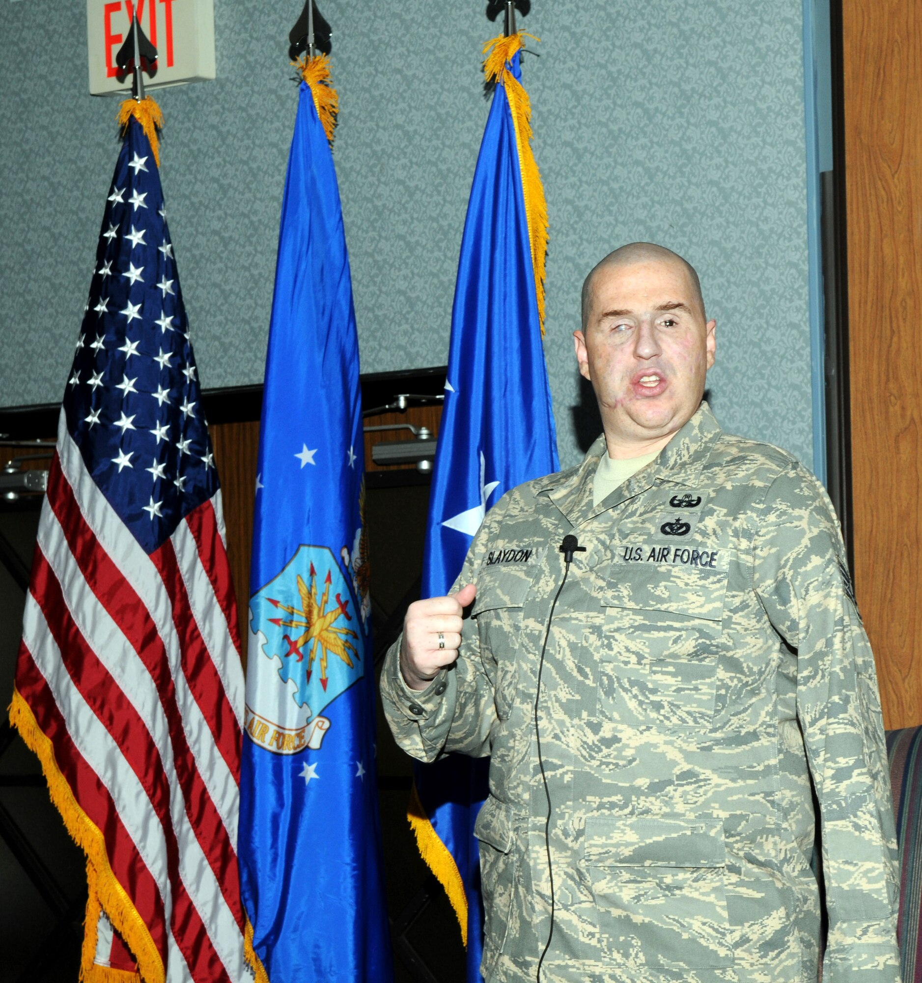 Staff Sgt. Matthew Slaydon talks about his injuries and subsequent rehabilitation during the Alamo Chapter of the Air Force Association's "Combat Breakfast" held Nov. 3 at the Enlisted Club at Randolph Air Force Base, Texas. Sergeant Slaydon was an explosive ordnance technician wounded in October 2007 in Kirkuk, Iraq. (U.S. Air Force photo/Joel Martinez) 

