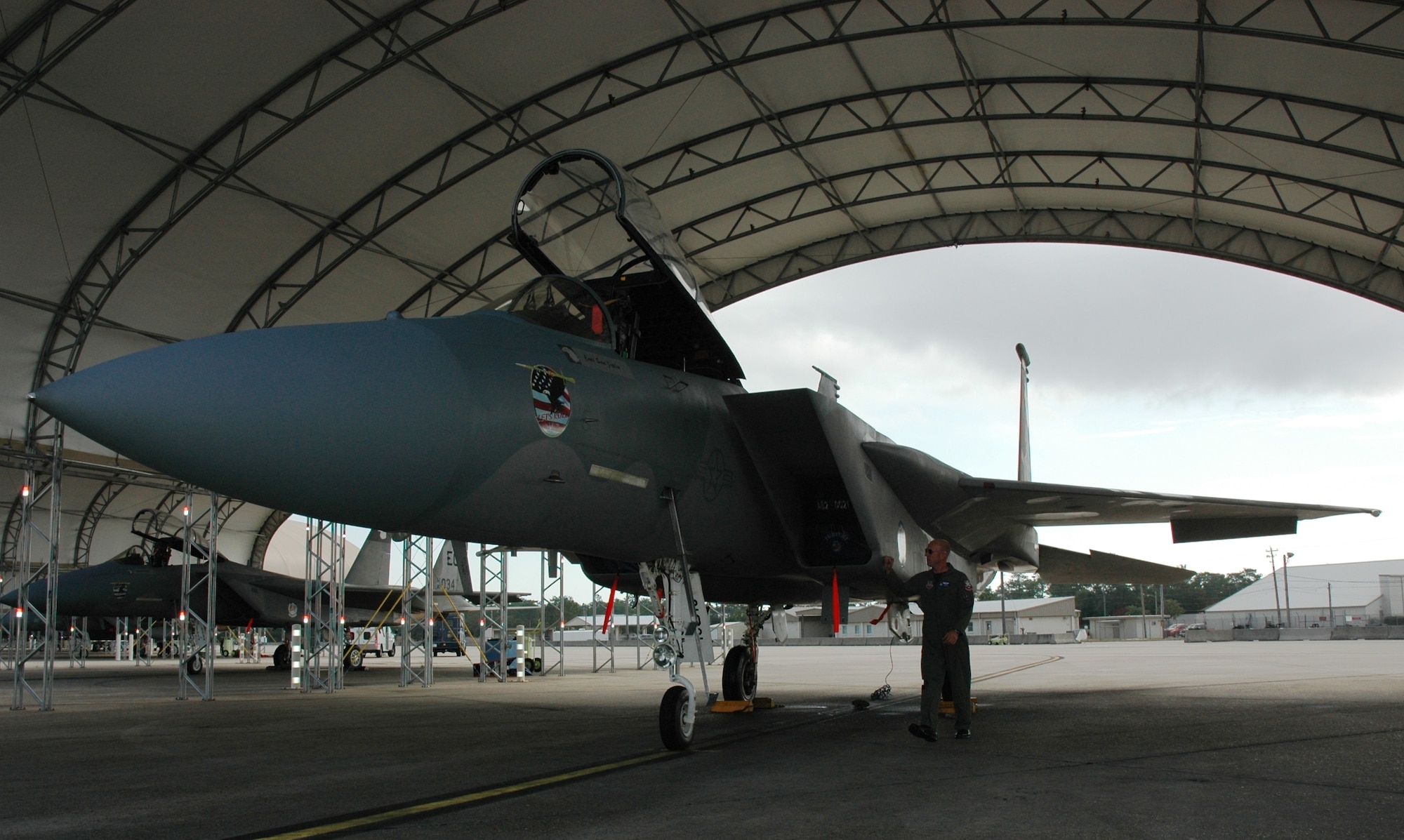 Capt. Sam Joplin, F-15C West Coast Demonstration Team pilot and officer in charge, performs a walk-around of his Eagle Nov. 12 at Eglin, hours before take-off. The team's 2008 season ends at the Blue Angel Homecoming Air Show Nov. 14-15. The 2009 season will begin next year in March and end with the 33rd Fighter Wing's Nomad Reunion in May.  (U.S. Air Force photo/Capt. Carrie L. Kessler)